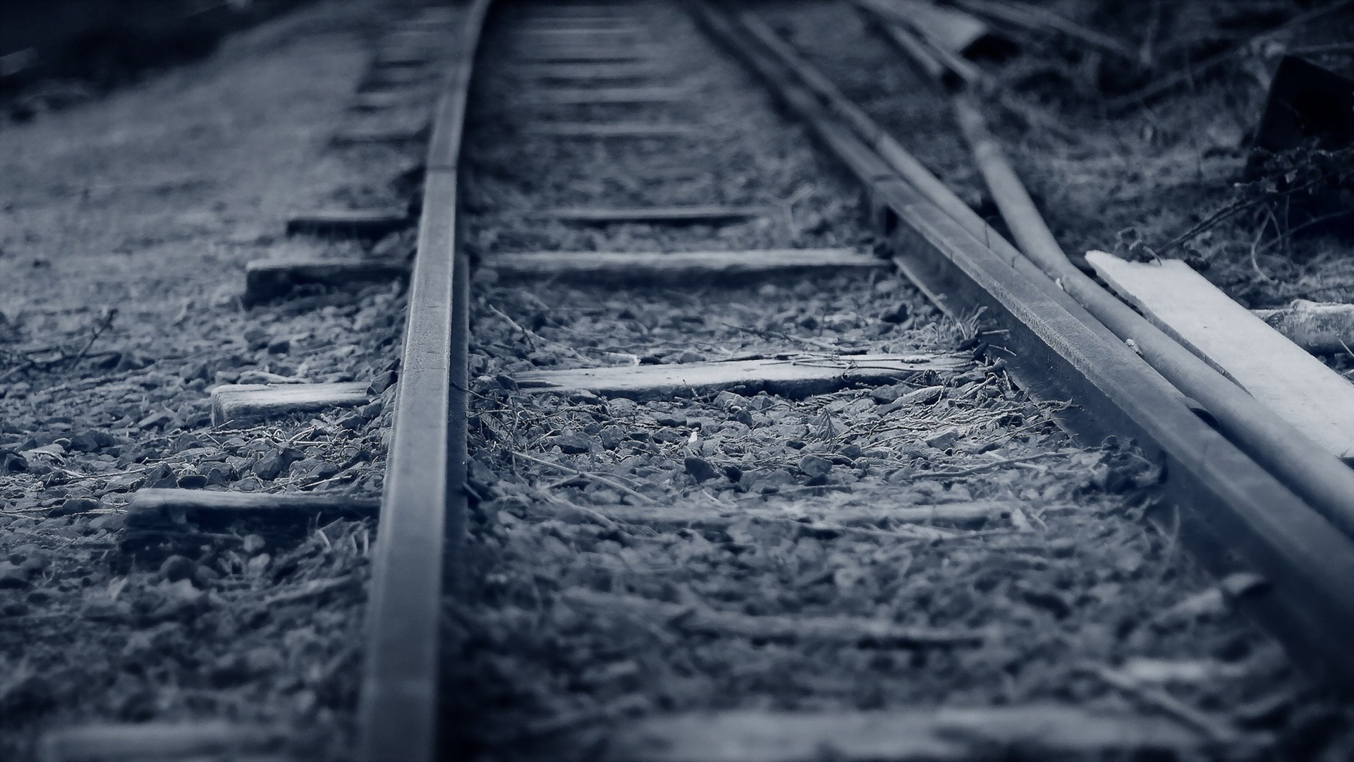 Close-up of abandoned railway tracks HD Wallpaper