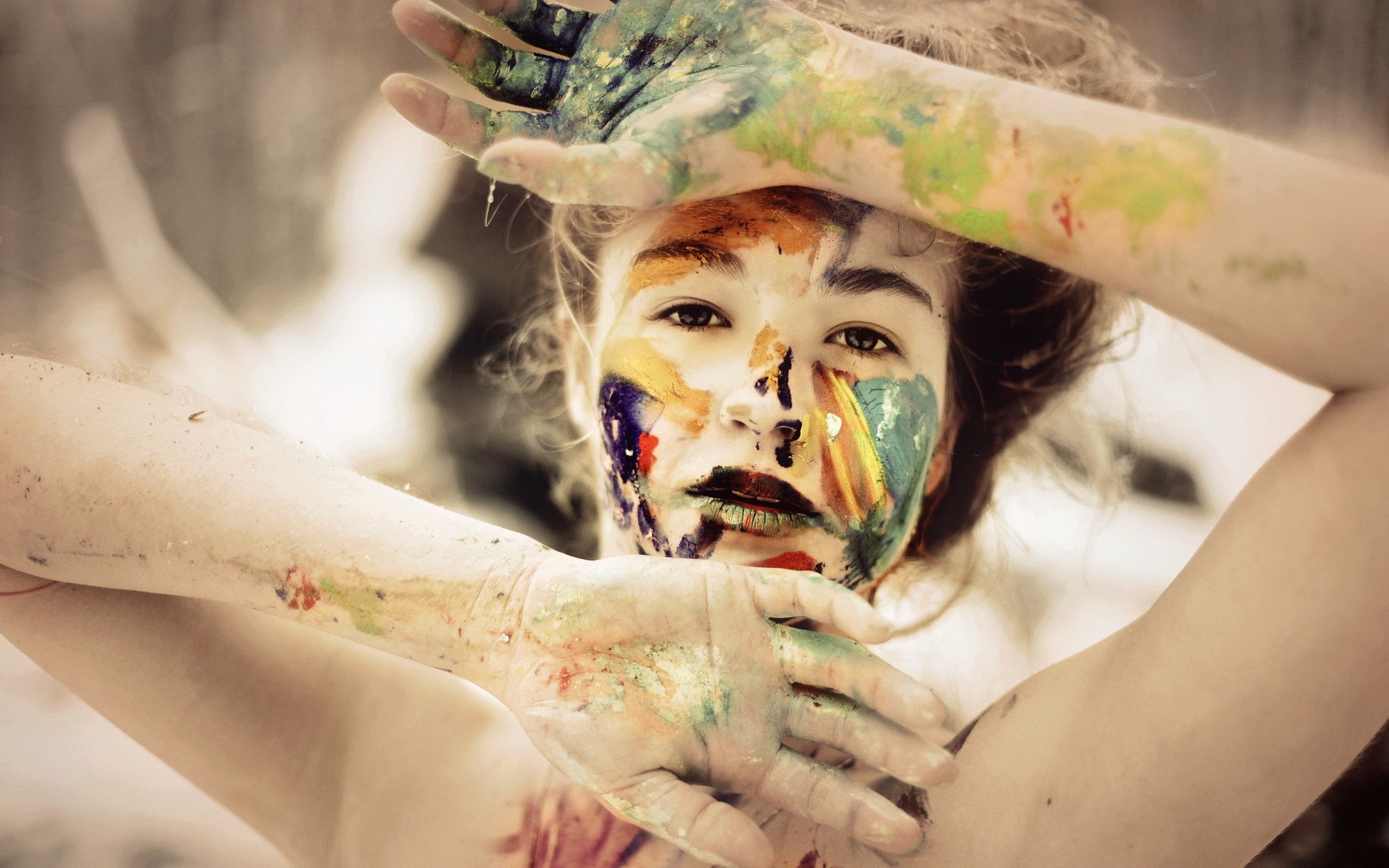Woman with colorful paint on her face and body HD Wallpaper