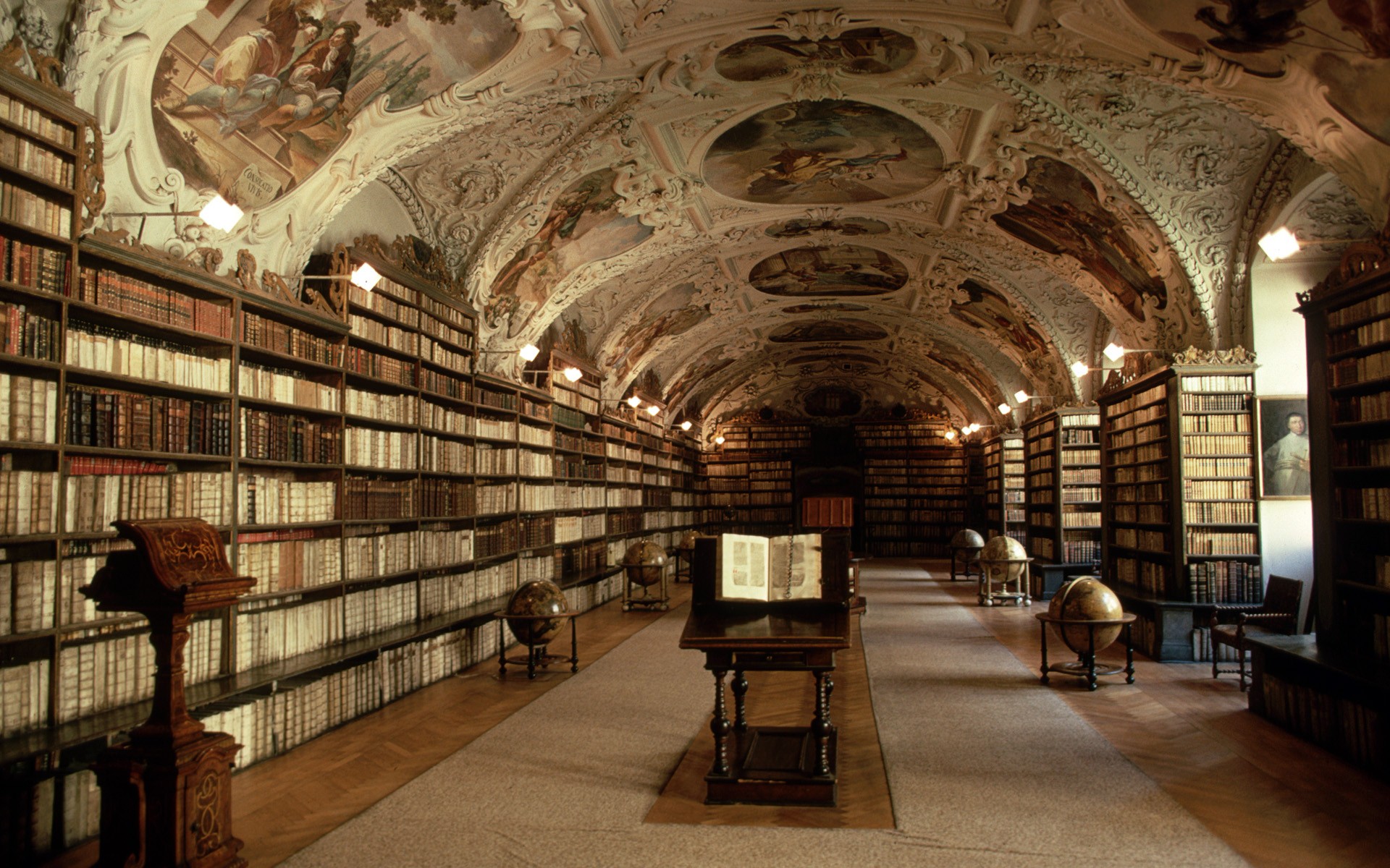 Baroque Library Interior with Bookshelves and Globes at Klementinum HD Wallpaper