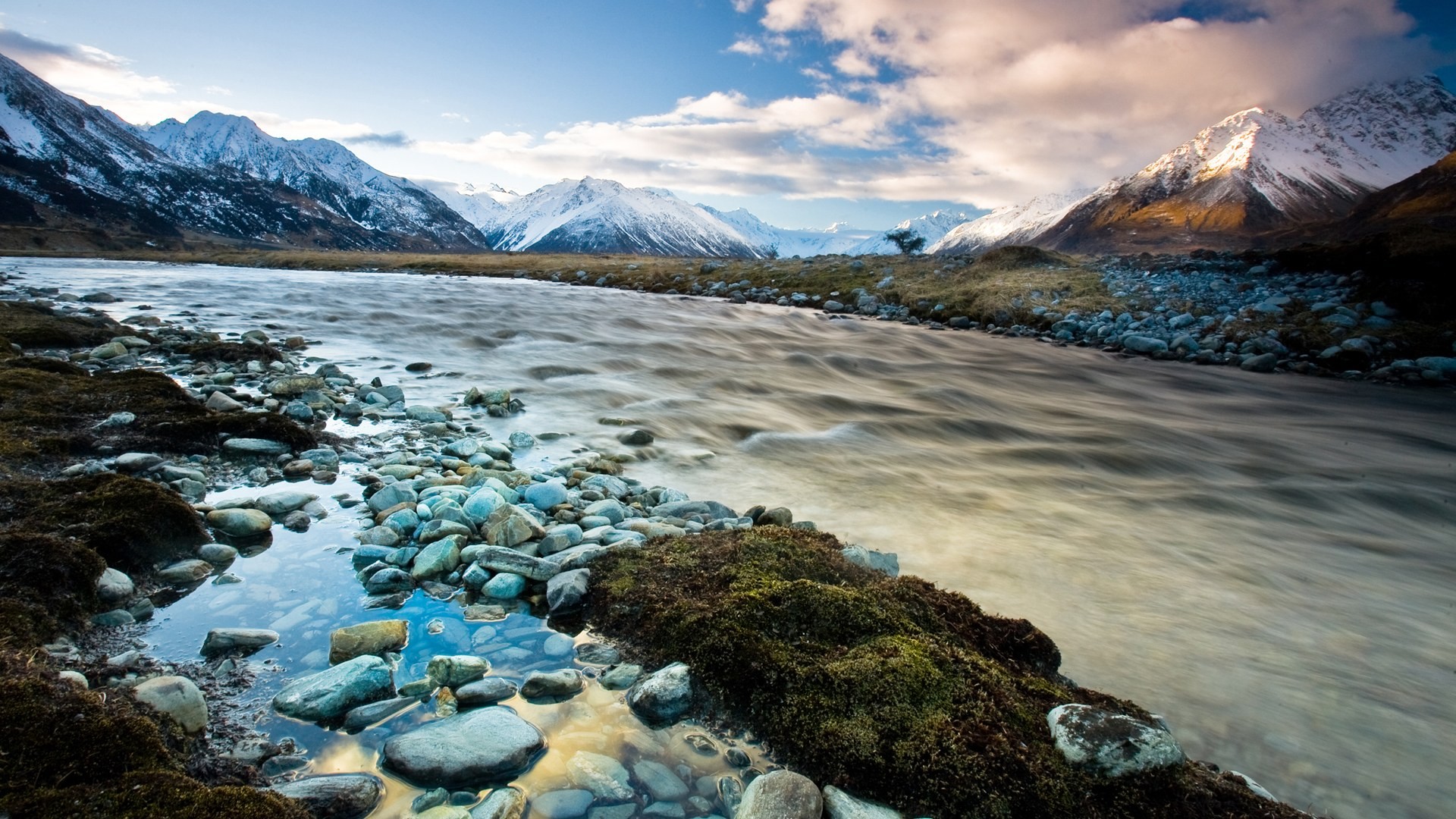 River flowing through mountains in New Zealand HD Wallpaper