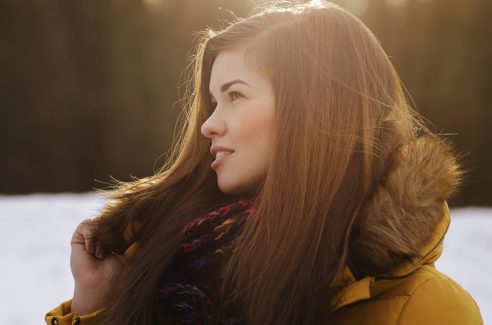 Woman with long brown hair in a yellow jacket HD Wallpaper