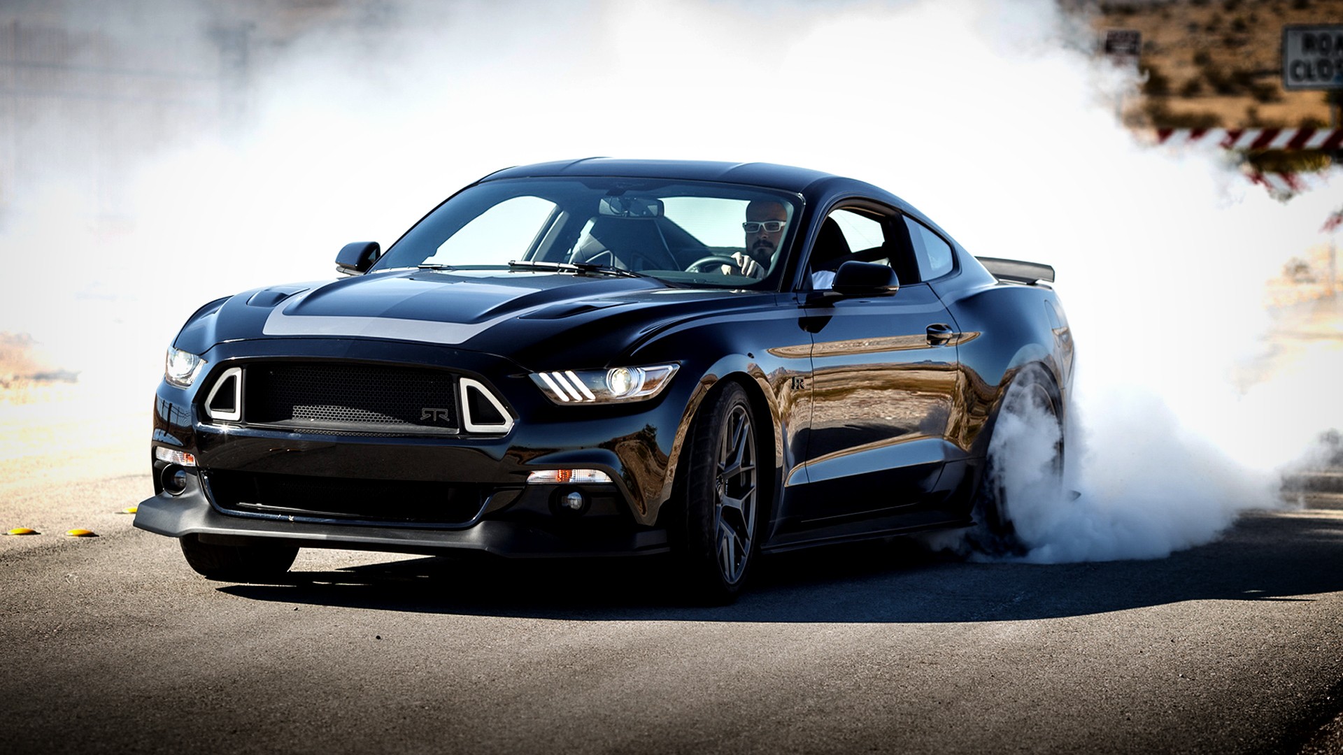 Black Ford Mustang doing a burnout HD Wallpaper