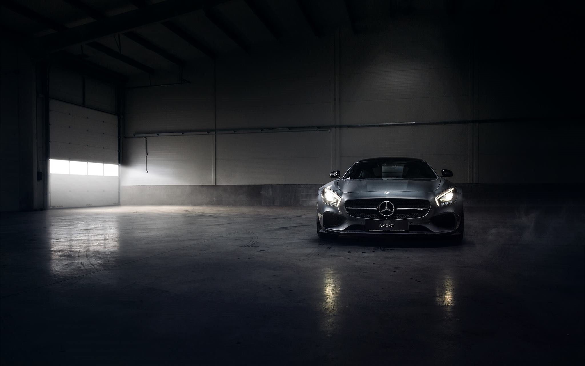 Mercedes-AMG GT parked in a dark garage HD Wallpaper