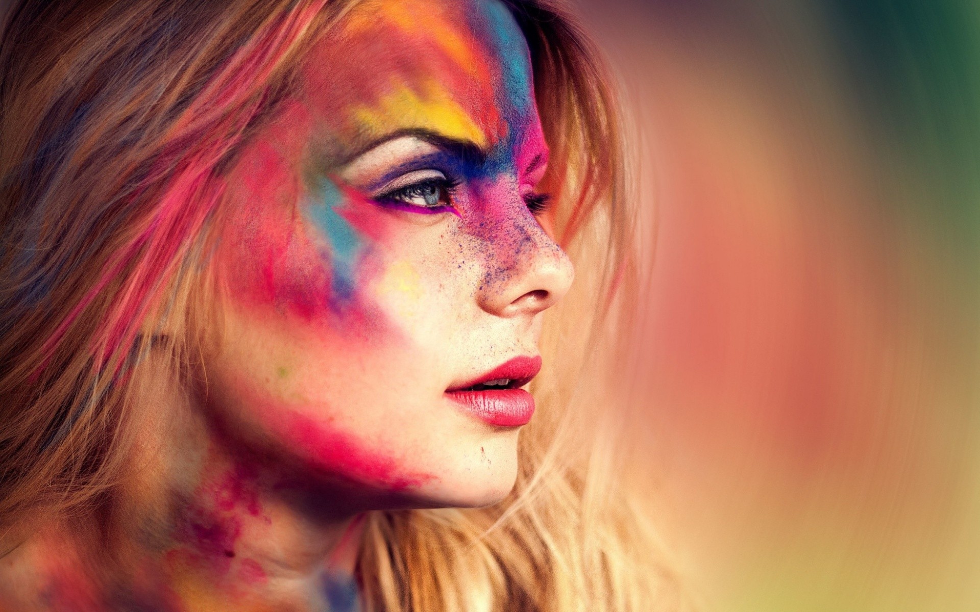 Woman with colorful paint on her face and hair HD Wallpaper