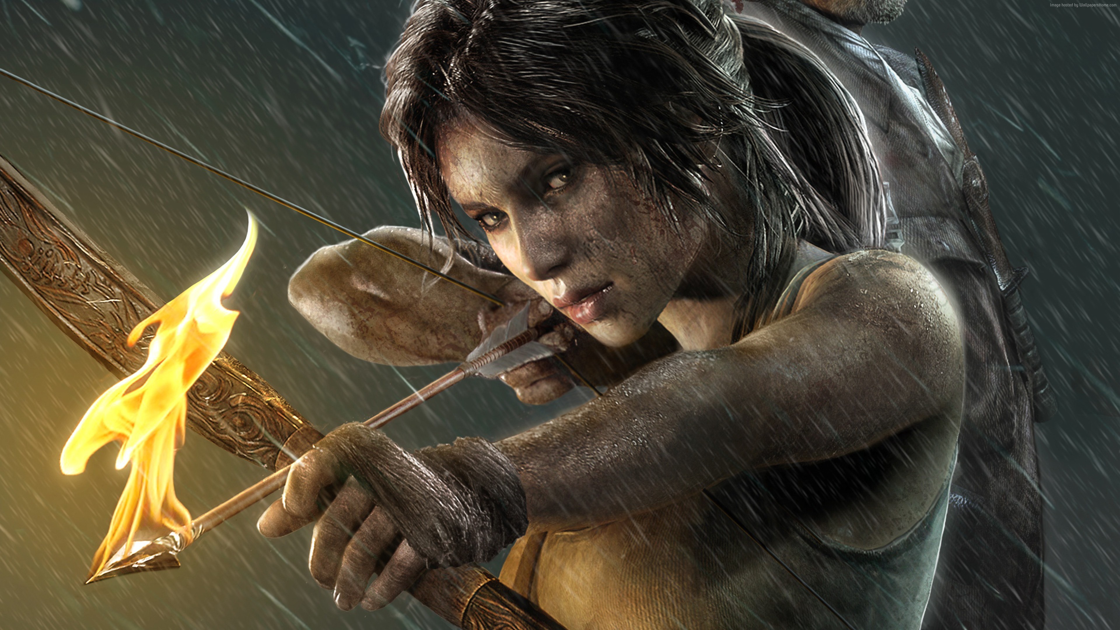 Lara Croft aims a flaming arrow in Tomb Raider HD Wallpaper