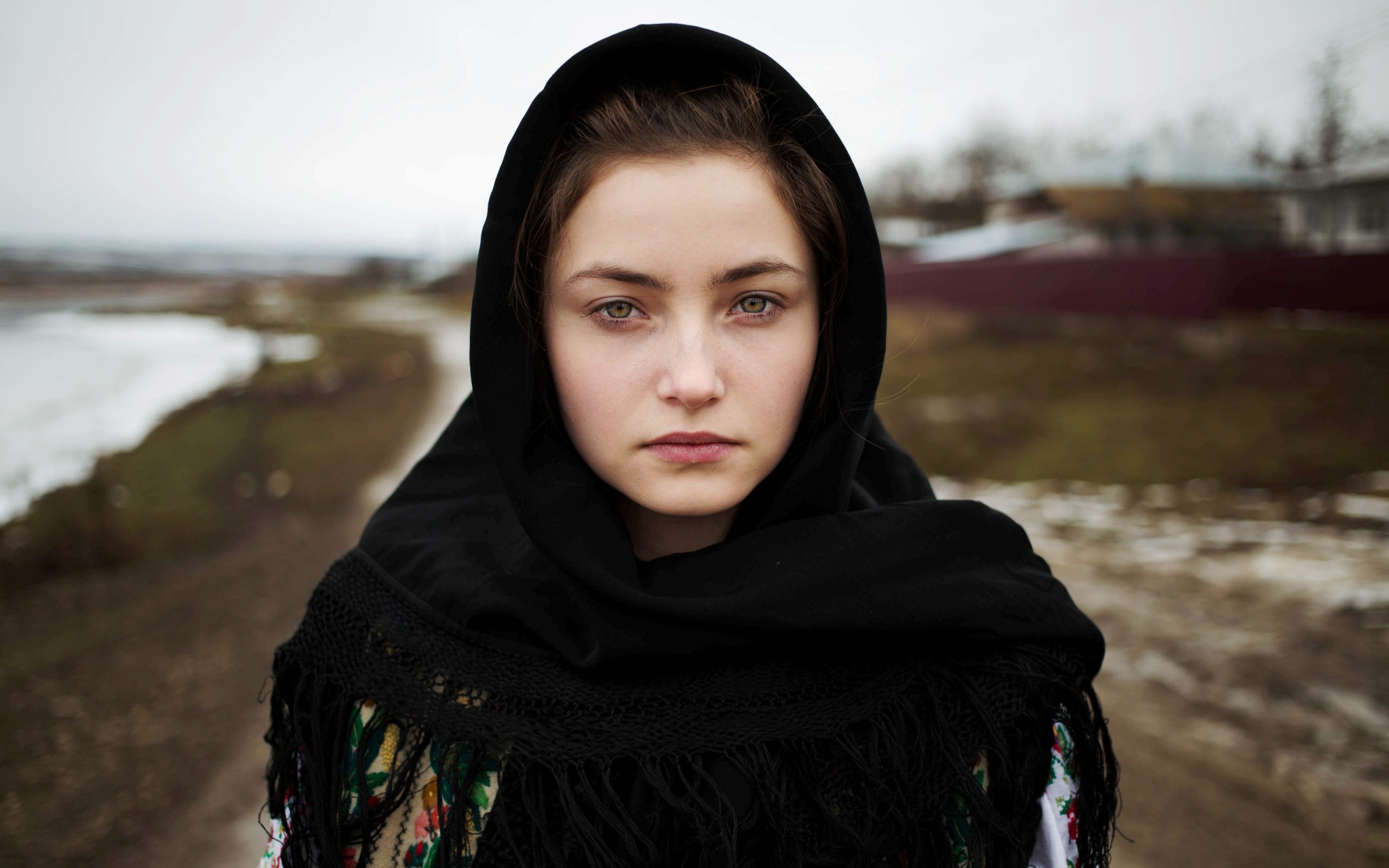 Young woman with green eyes wearing a black scarf HD Wallpaper