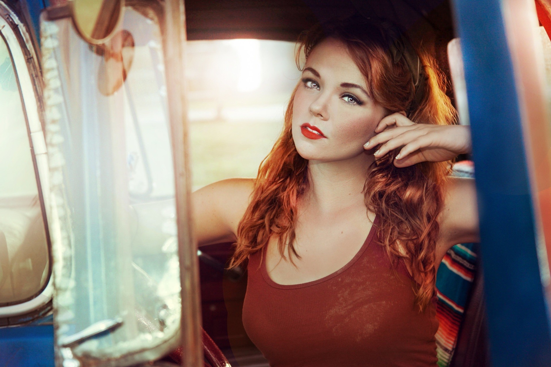 Redhead woman with red lipstick in a car HD Wallpaper