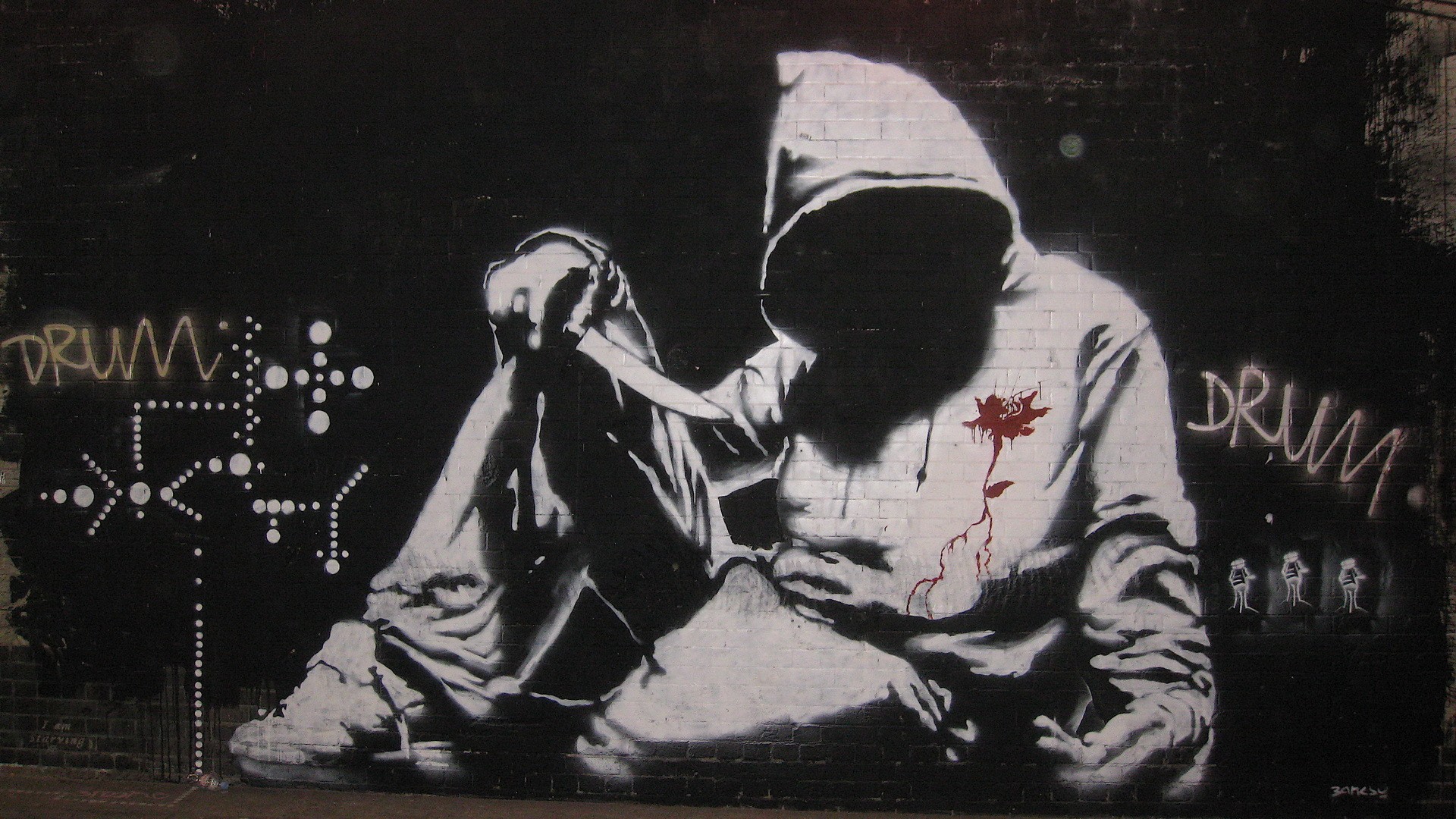 Graffiti of a hooded figure with a knife and a rose HD Wallpaper