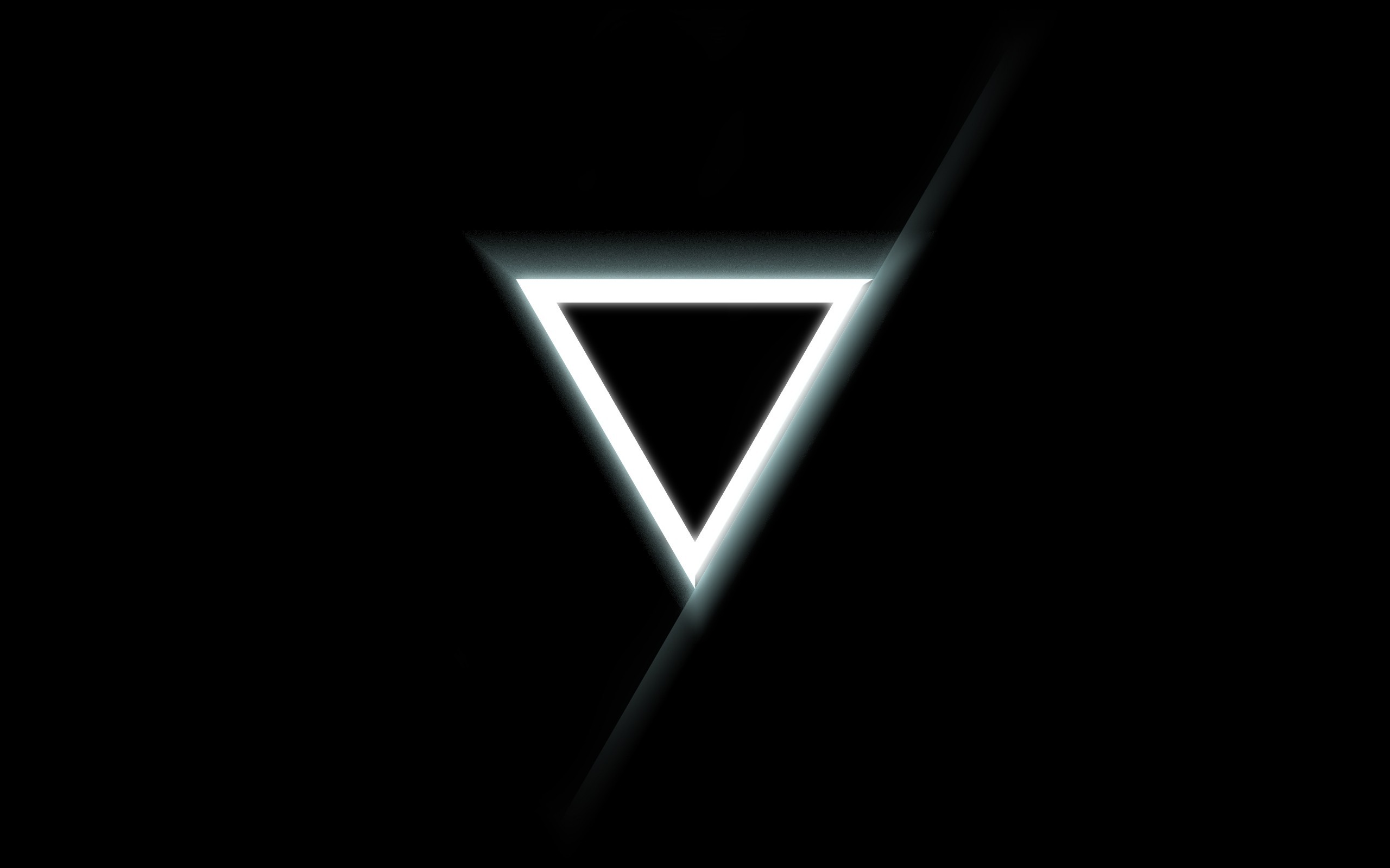 Glowing triangle on a black background HD Wallpaper