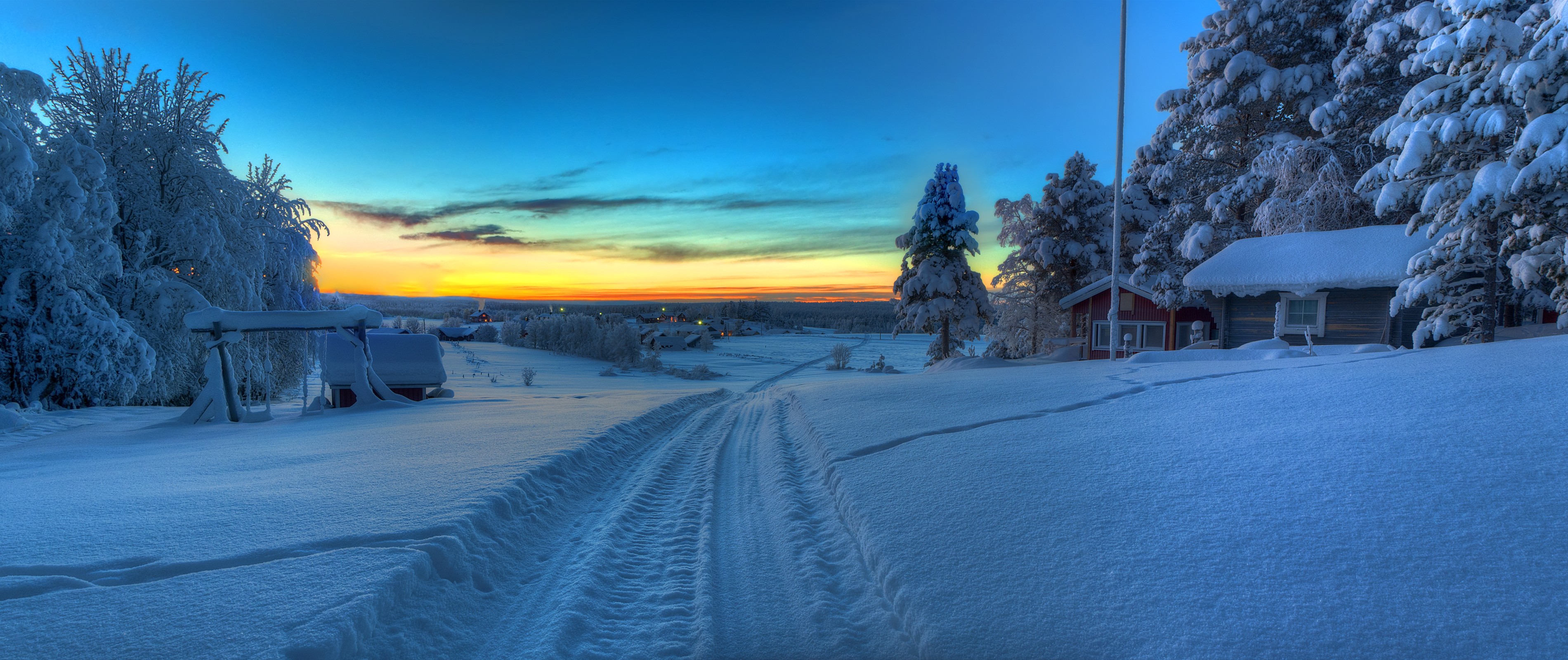 Winter landscape with snow-covered trees and a sunset HD Wallpaper