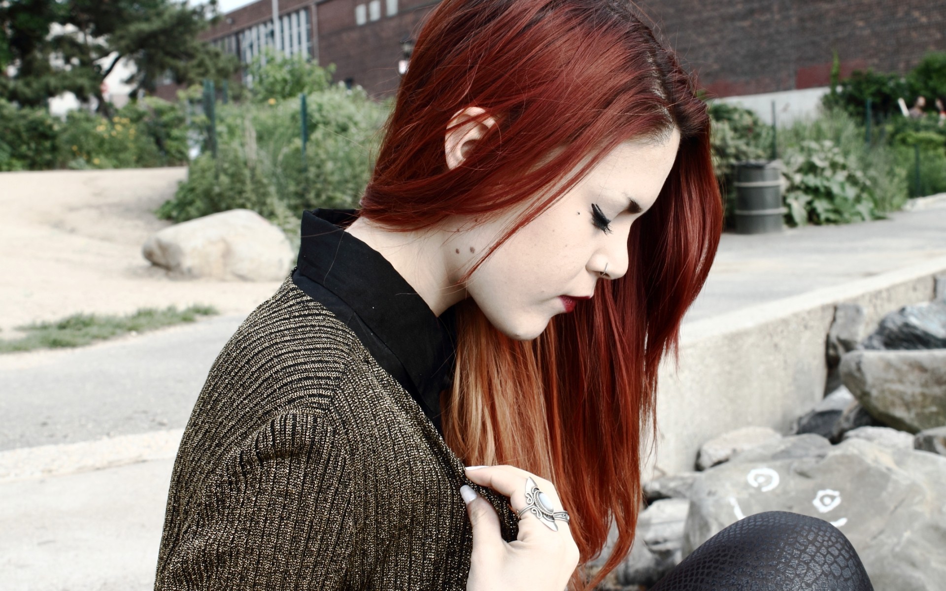 Redhead woman with nose piercing looking down HD Wallpaper