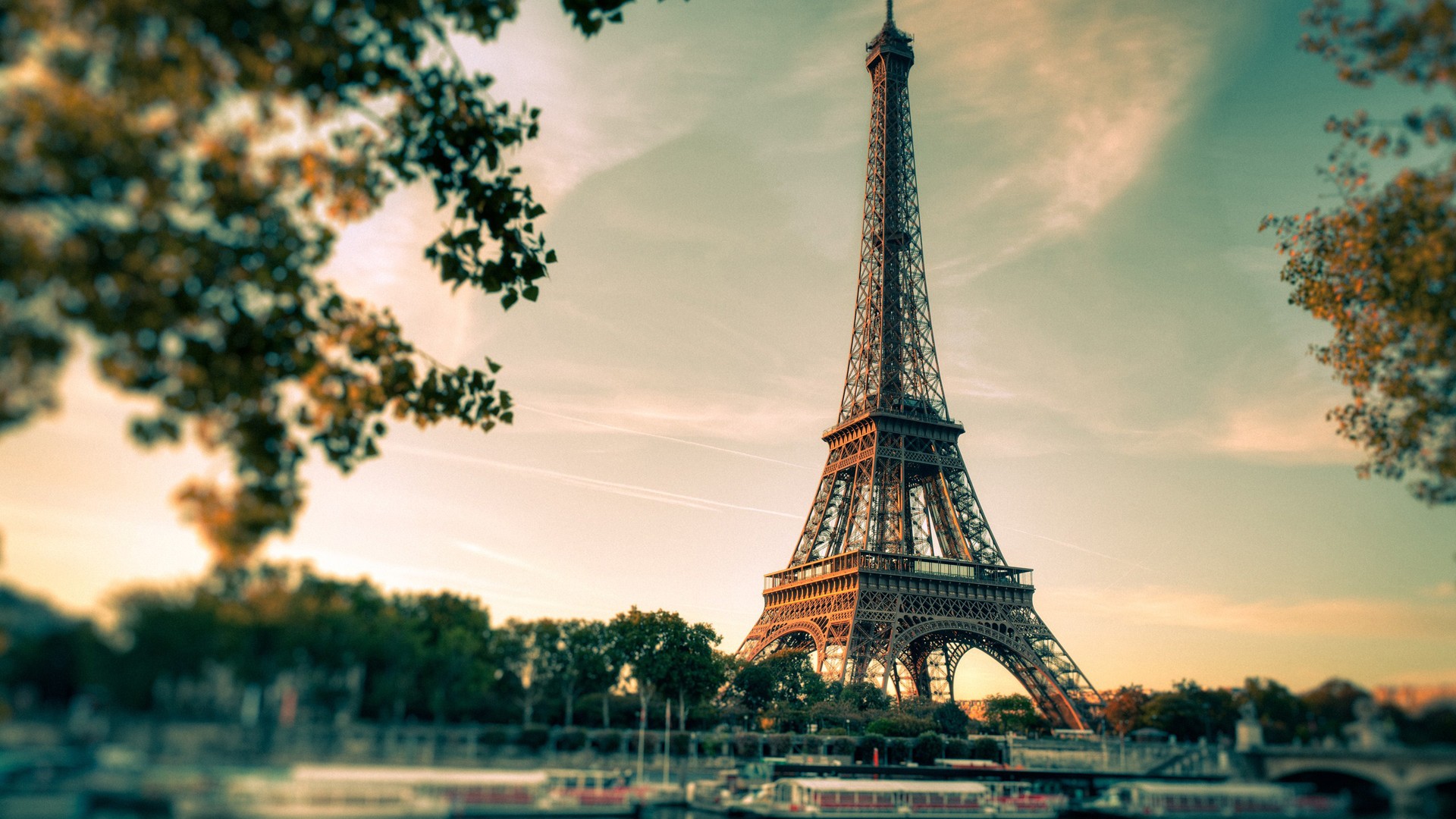 Eiffel Tower in Paris with trees and river HD Wallpaper
