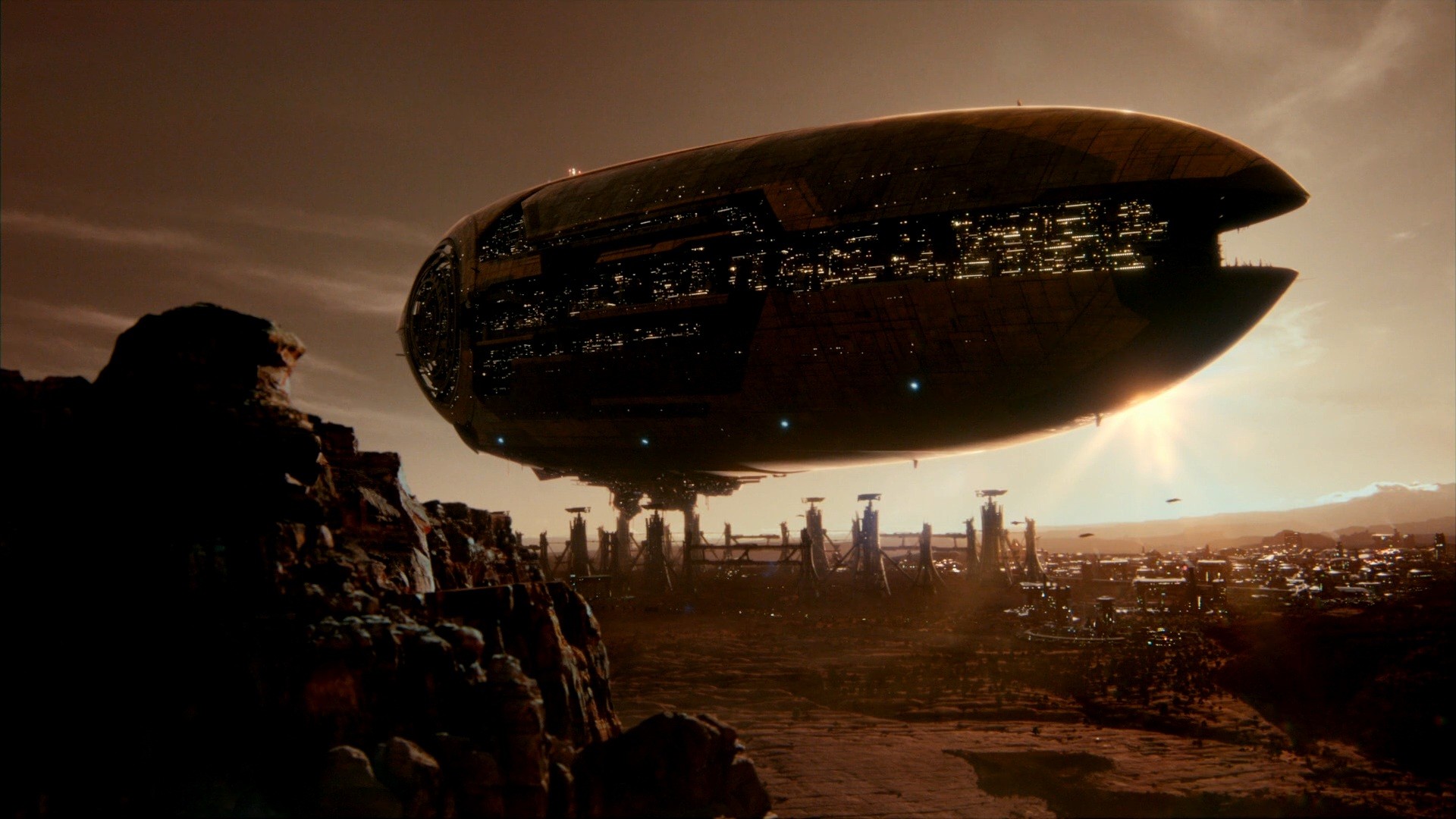 Futuristic spaceship hovering over a settlement HD Wallpaper
