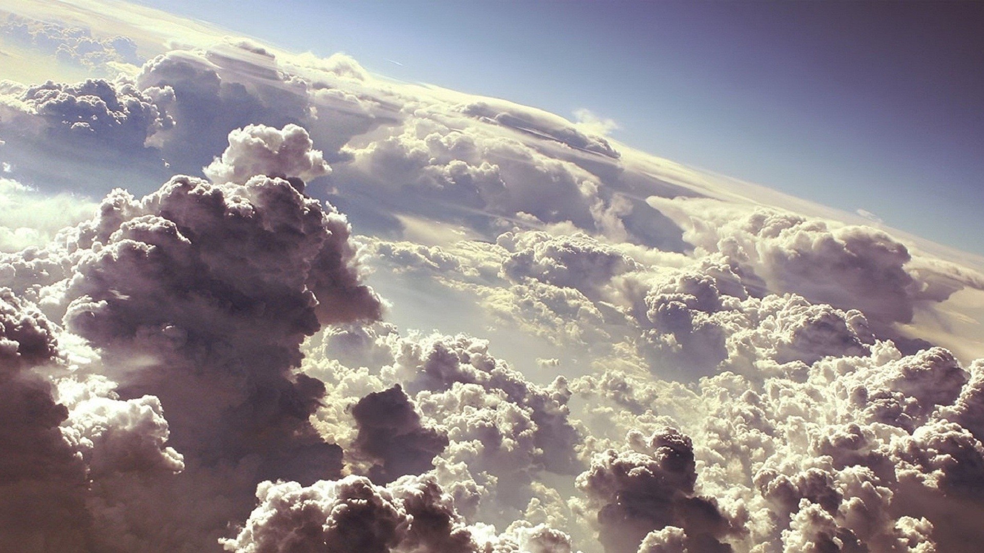 Clouds and sky from above HD Wallpaper