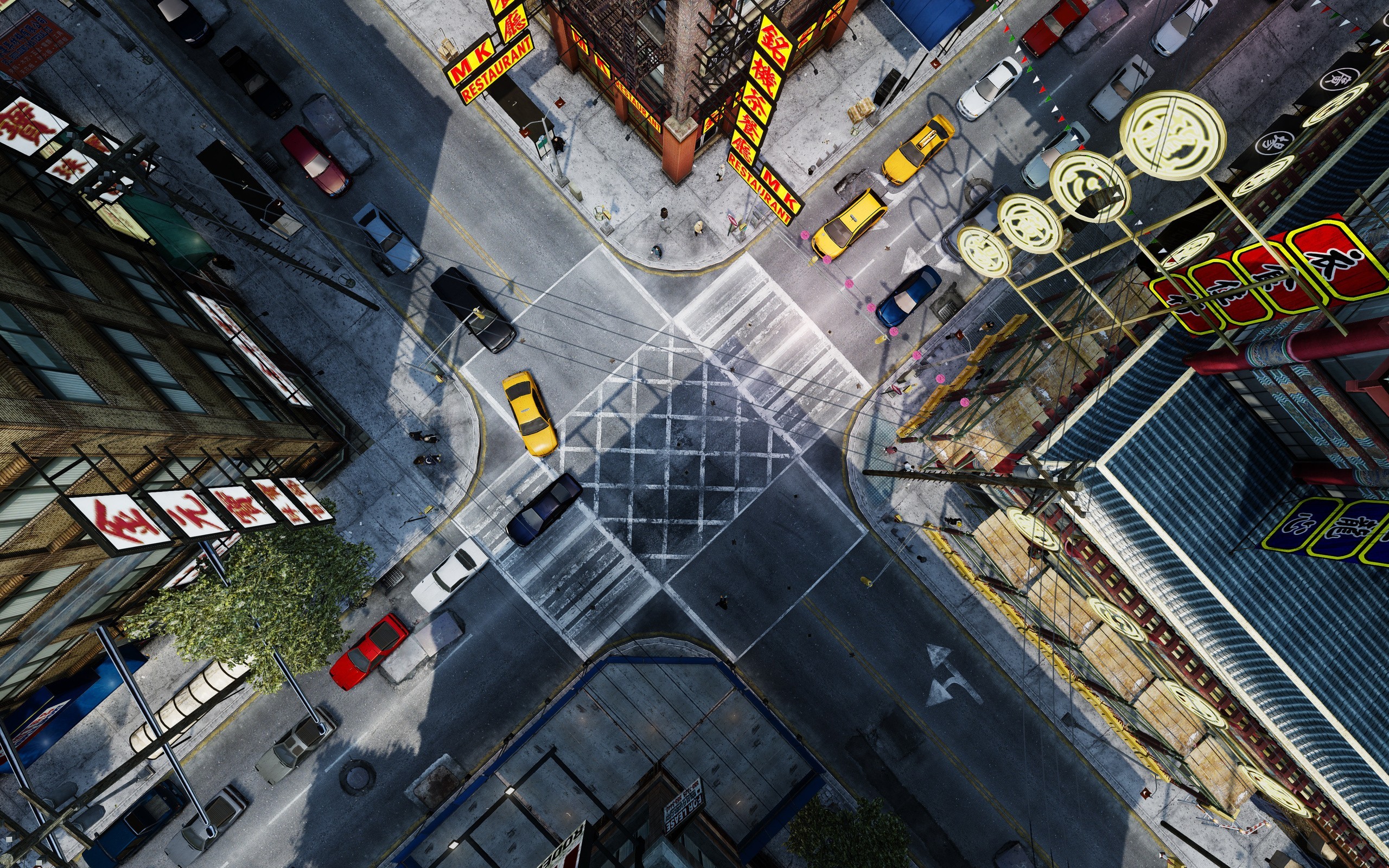 Top-down view of a city intersection in Grand Theft Auto IV HD Wallpaper