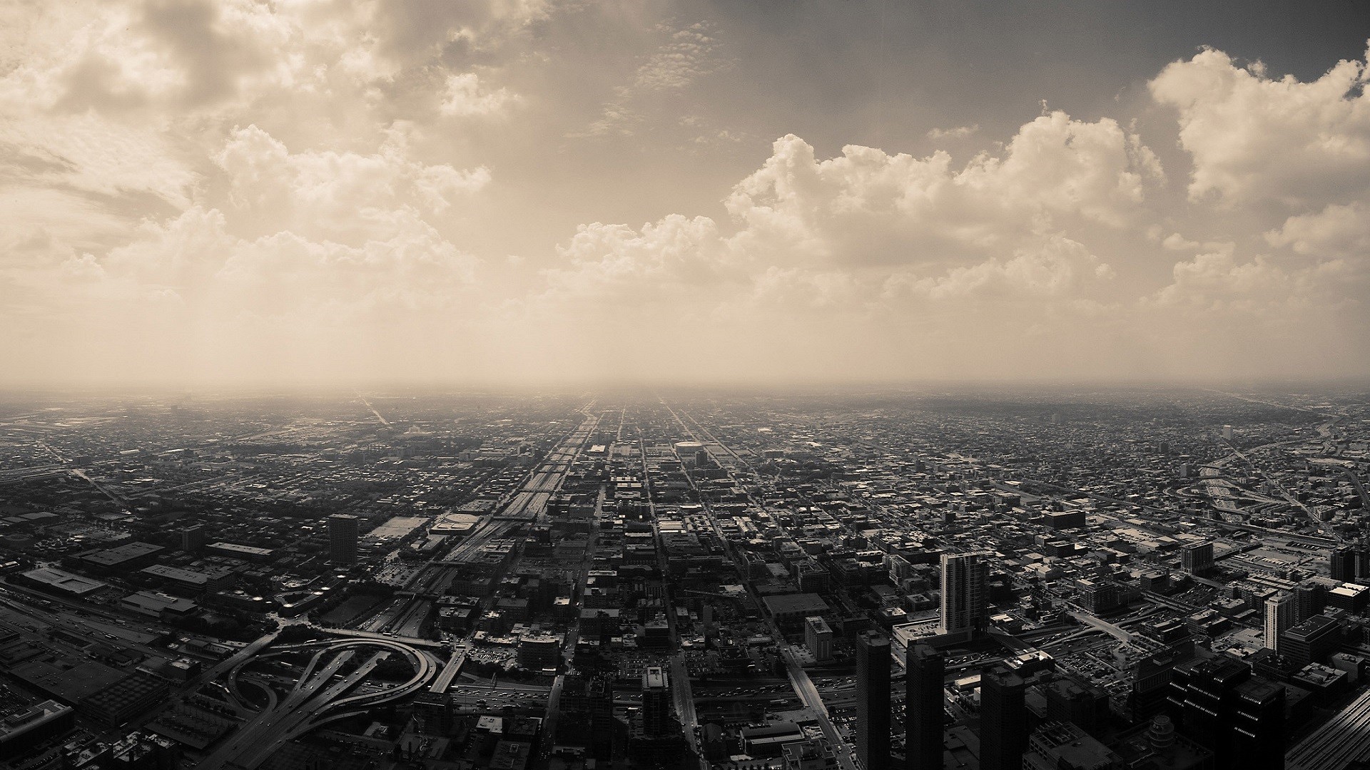 Aerial view of Chicago cityscape with clouds HD Wallpaper
