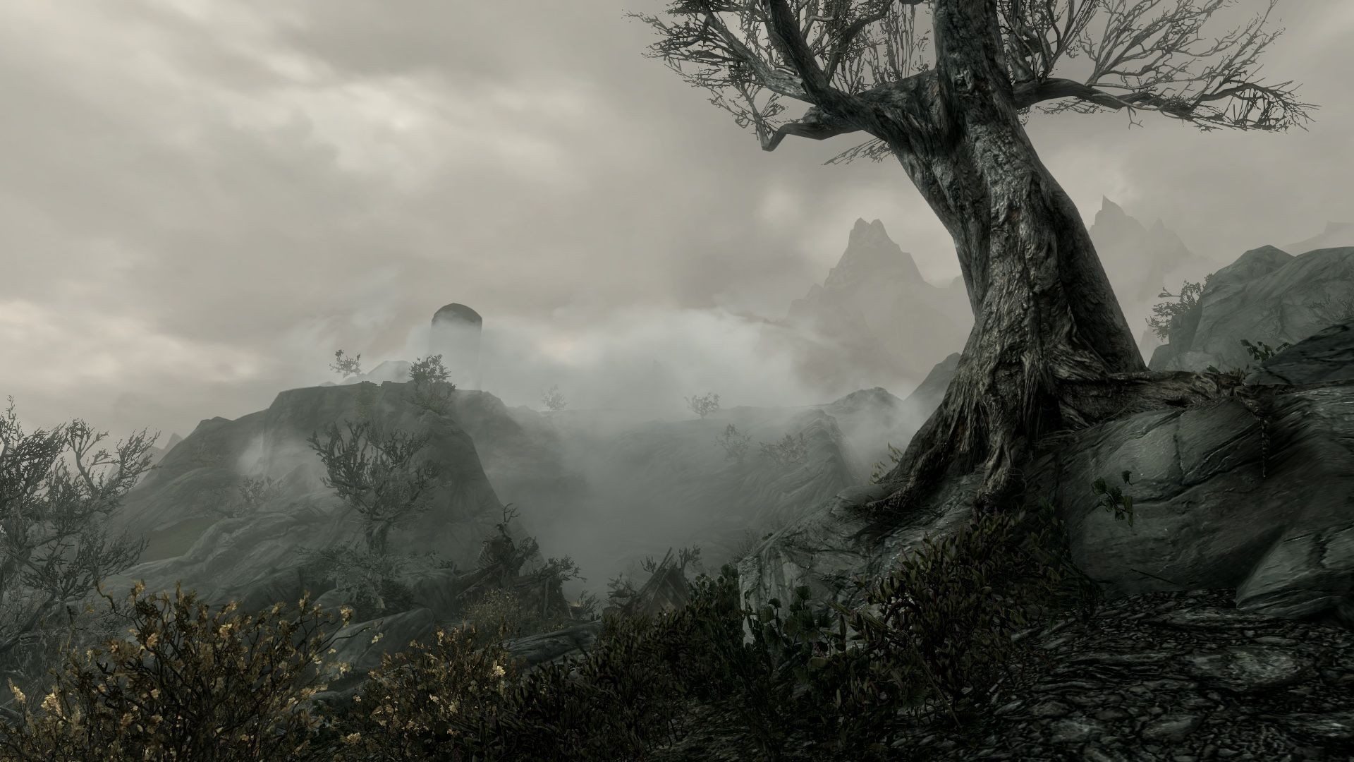 The Elder Scrolls V: Skyrim landscape with mountains and fog HD Wallpaper