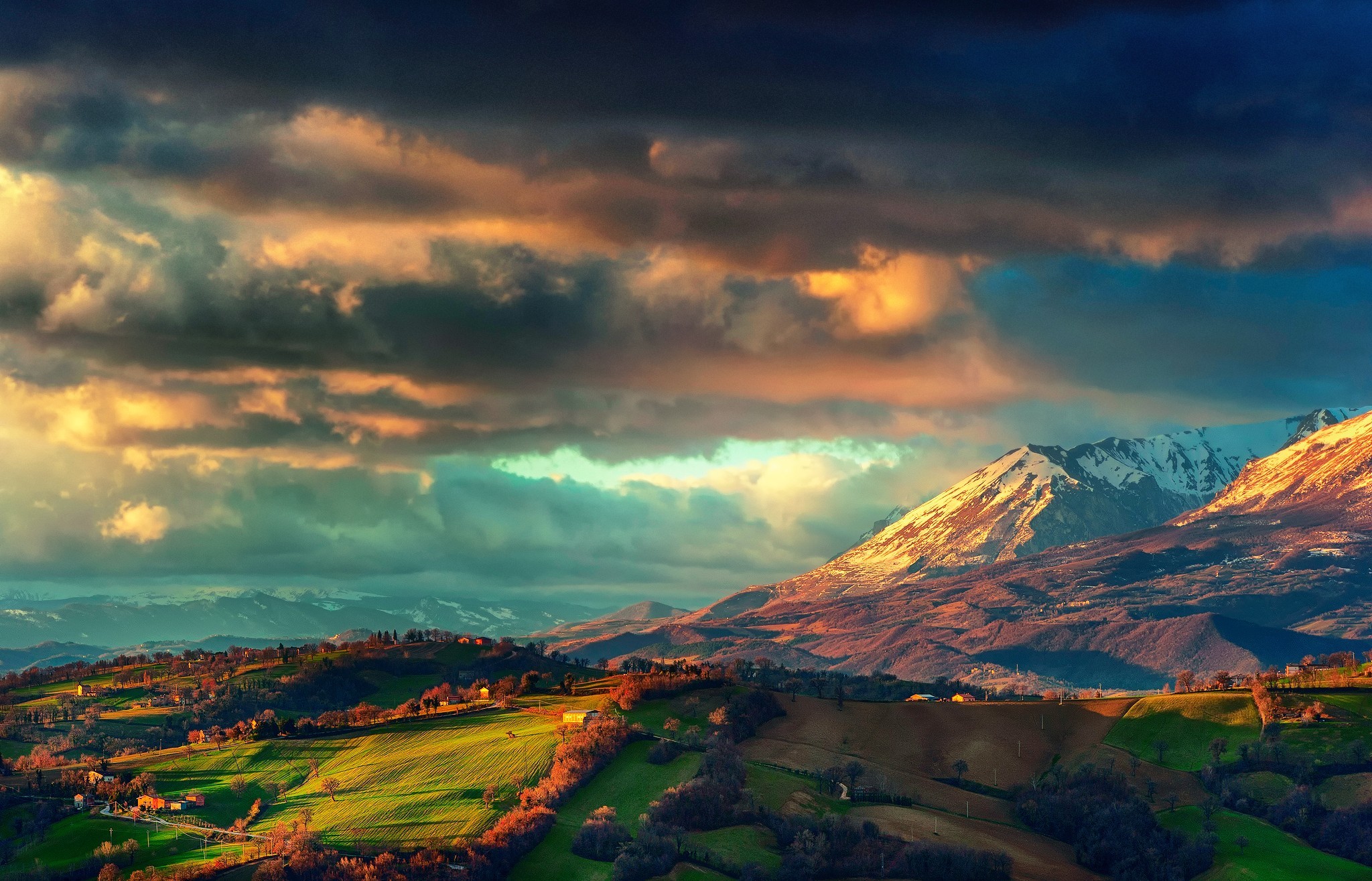 Mountain landscape with dramatic clouds at sunset HD Wallpaper