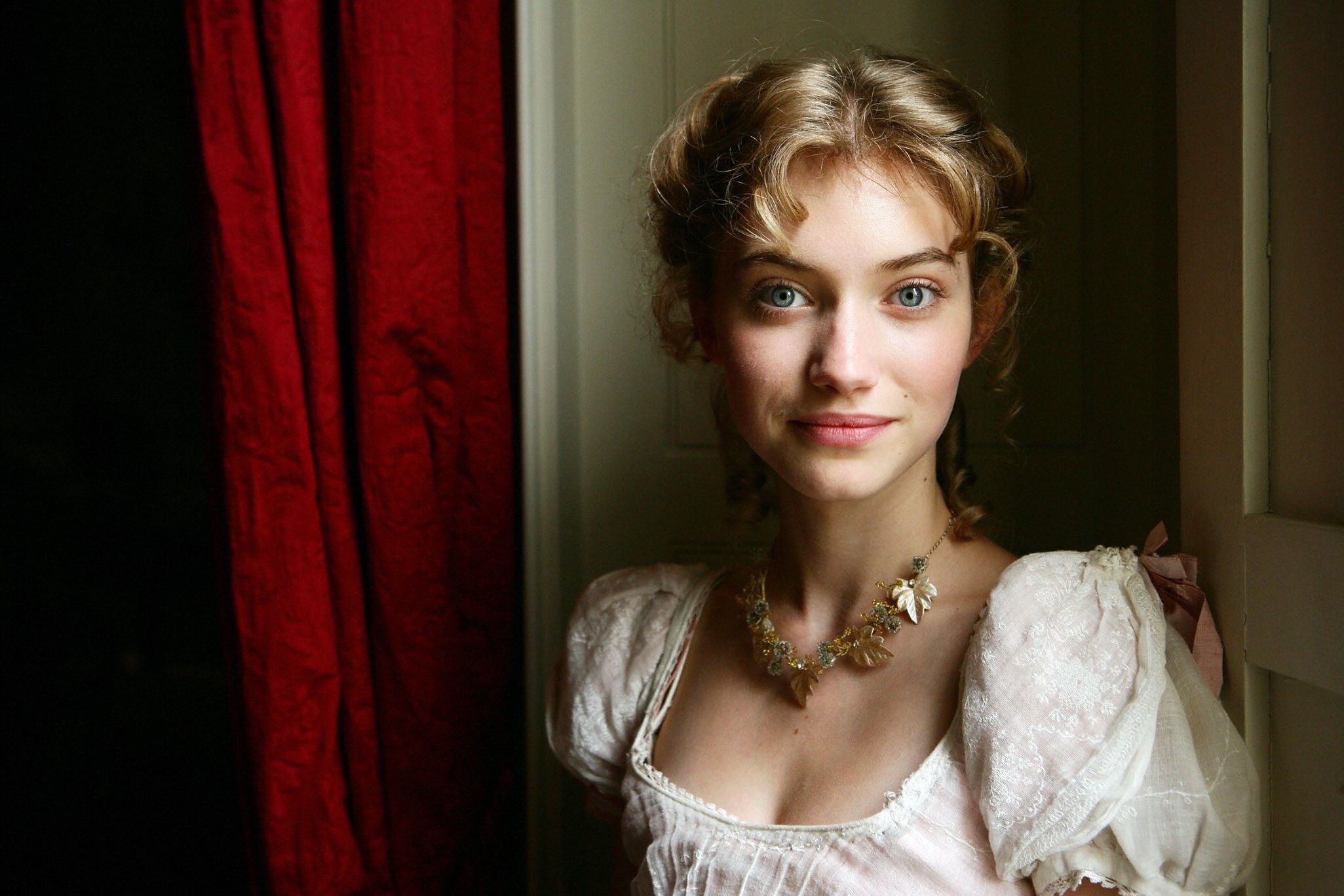 Imogen Poots in a period costume with a red curtain HD Wallpaper