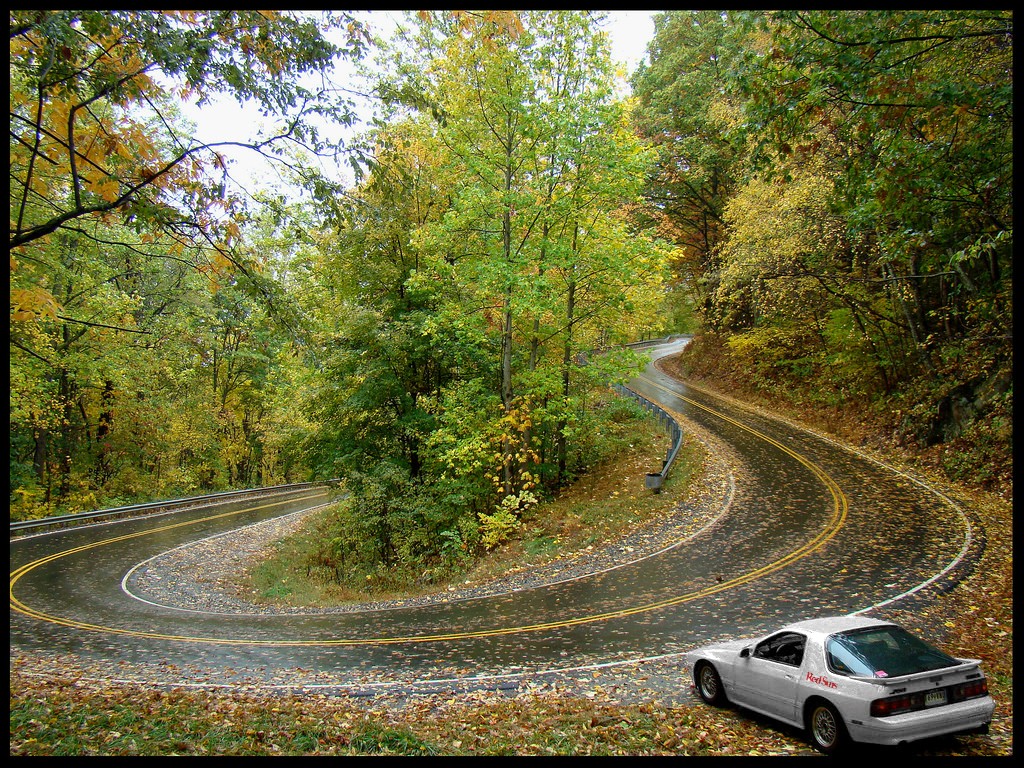 White Mazda RX-7 on a winding road in fall HD Wallpaper