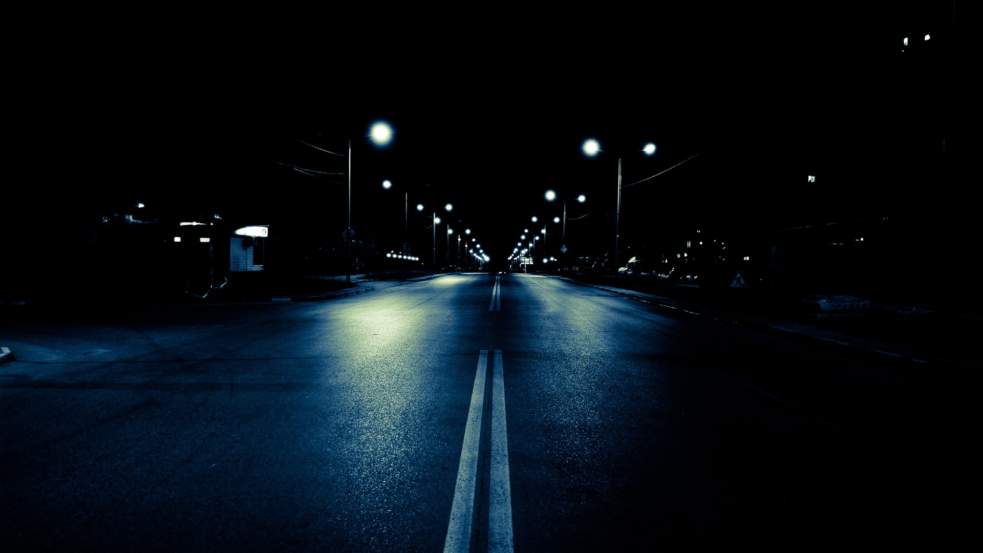 Empty street at night with street lights HD Wallpaper