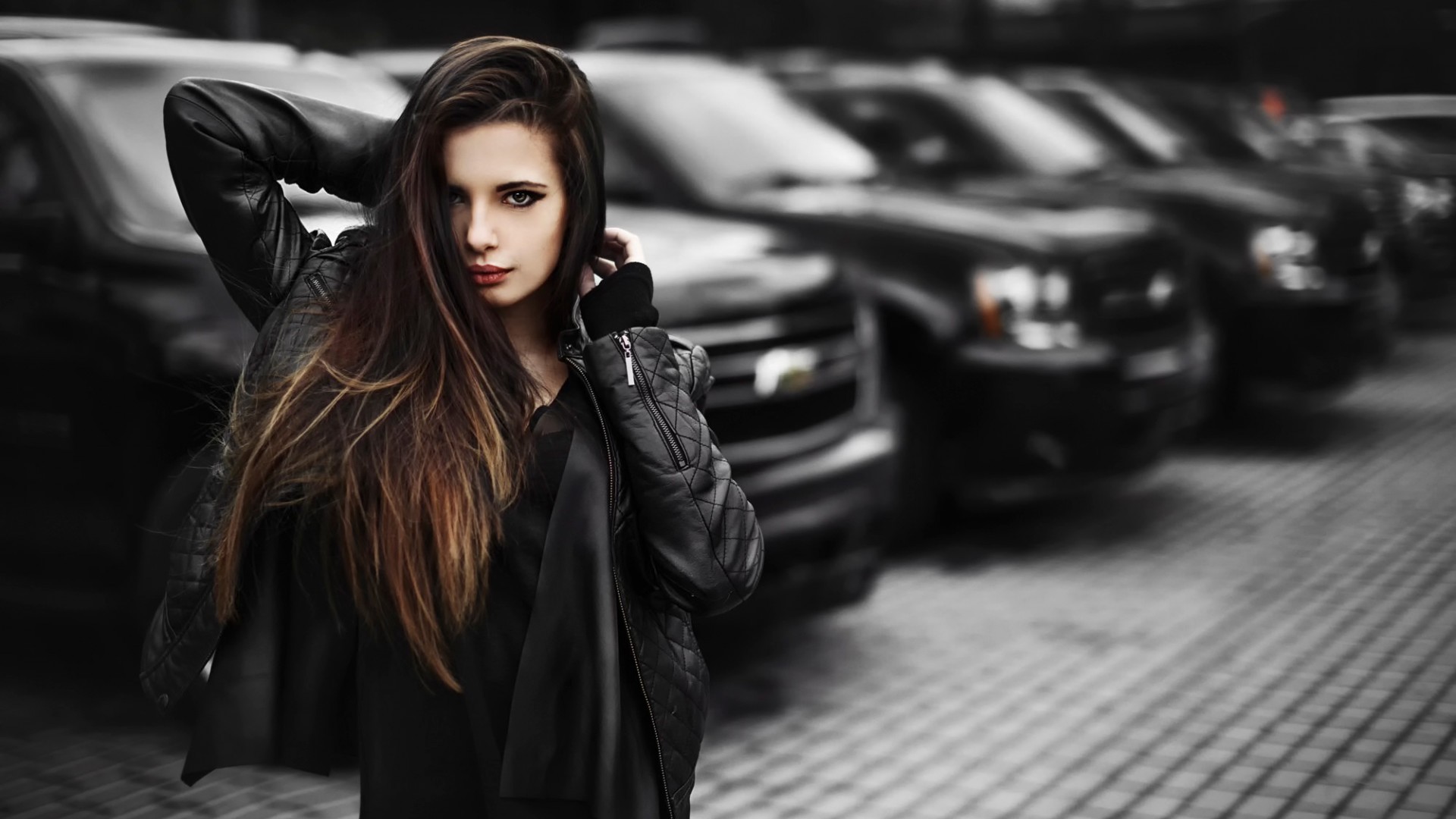 Woman in leather jacket with cars HD Wallpaper