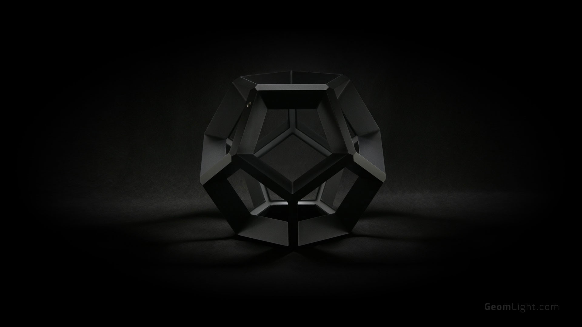 Black geometric object on a dark background HD Wallpaper
