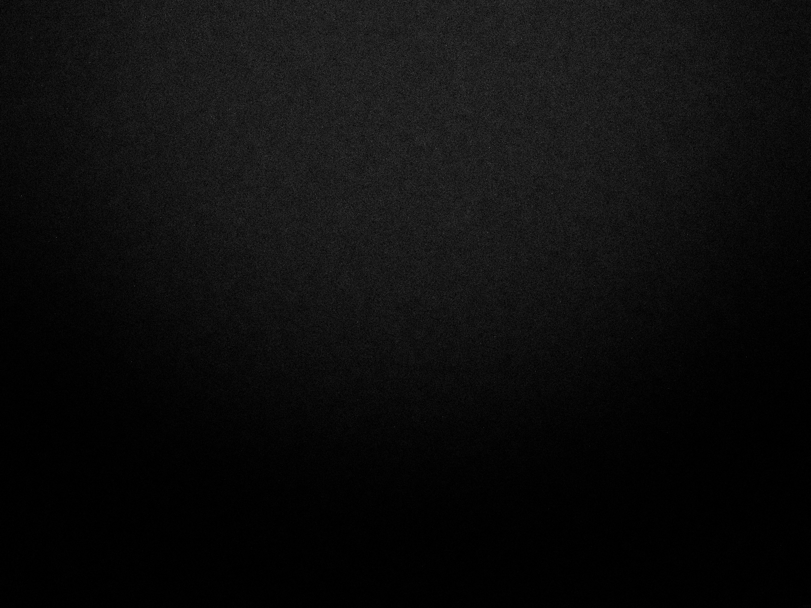 Black textured surface with subtle gradient HD Wallpaper