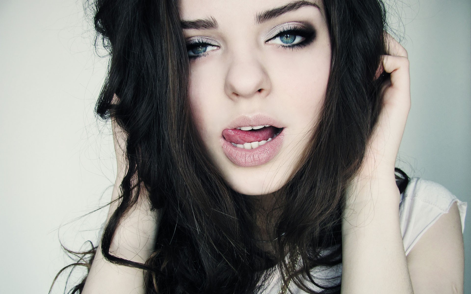 Woman with dark hair and blue eyes HD Wallpaper