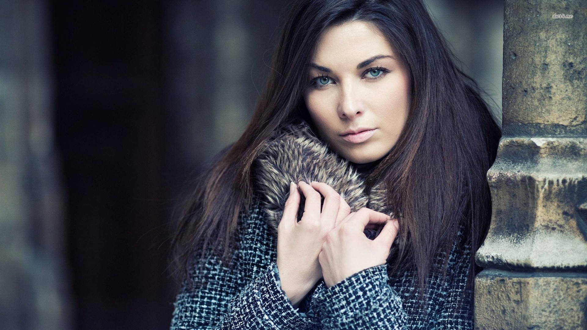 Woman with dark hair and blue eyes wearing a coat HD Wallpaper