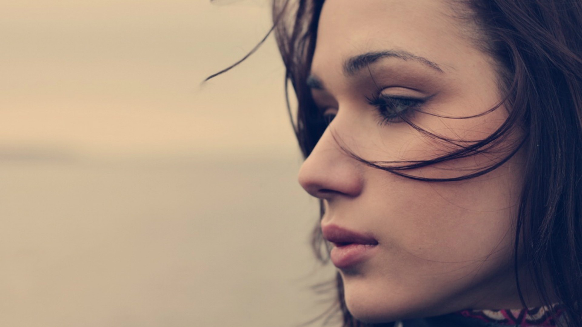 Portrait of a young woman with dark hair HD Wallpaper