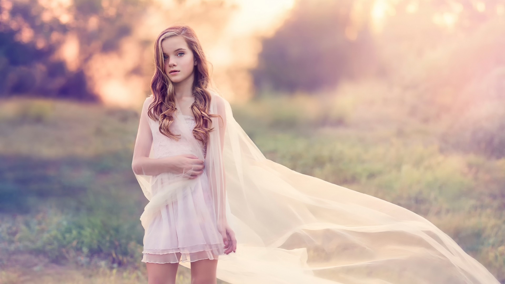 Young girl in a white dress with a flowing veil HD Wallpaper