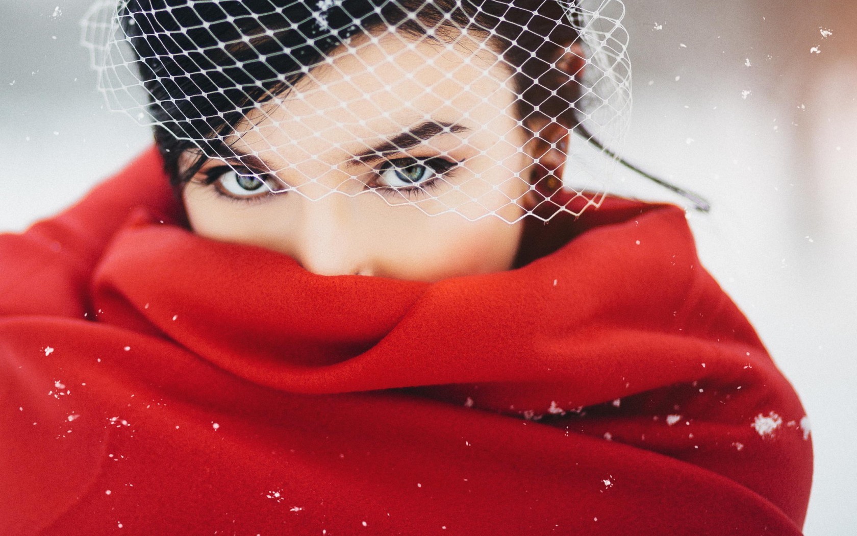 Woman in red scarf and veil in snow HD Wallpaper