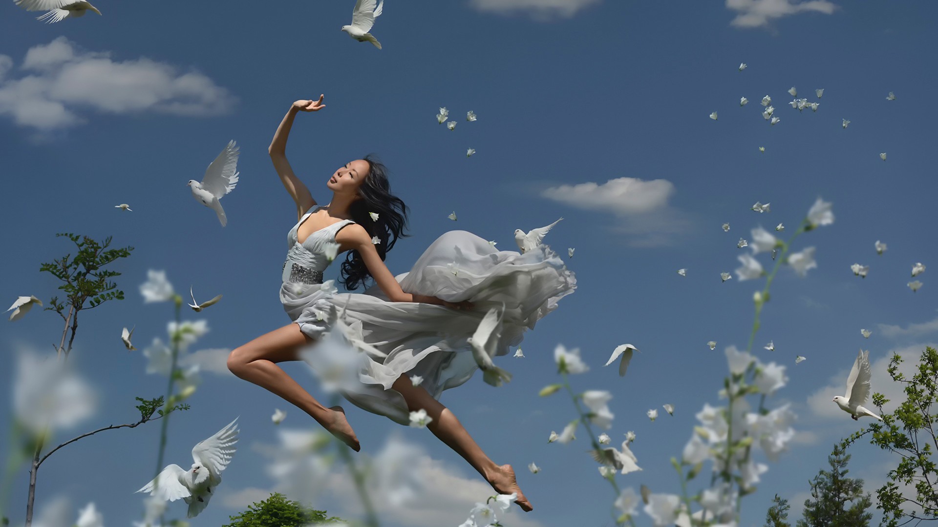 Asian woman dancing with doves in the sky HD Wallpaper