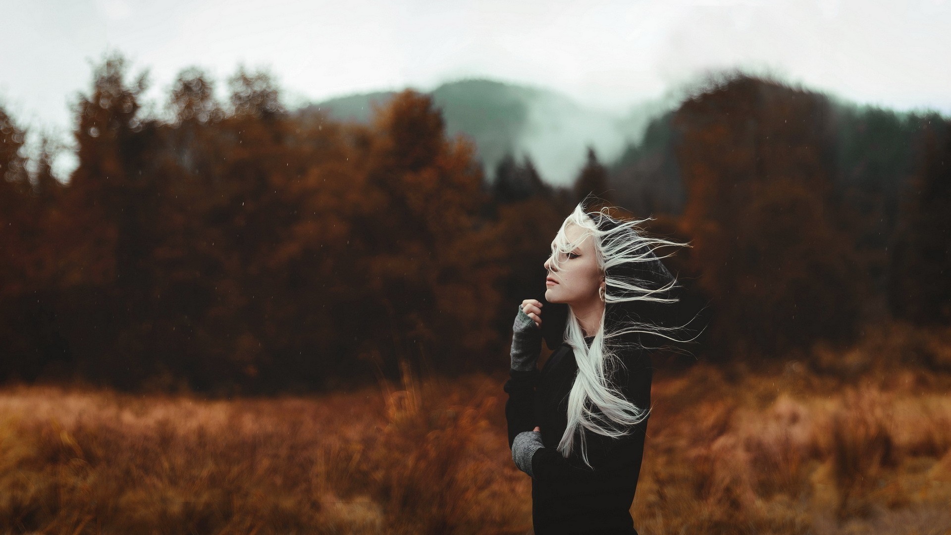 Woman with white hair in a dark outfit HD Wallpaper