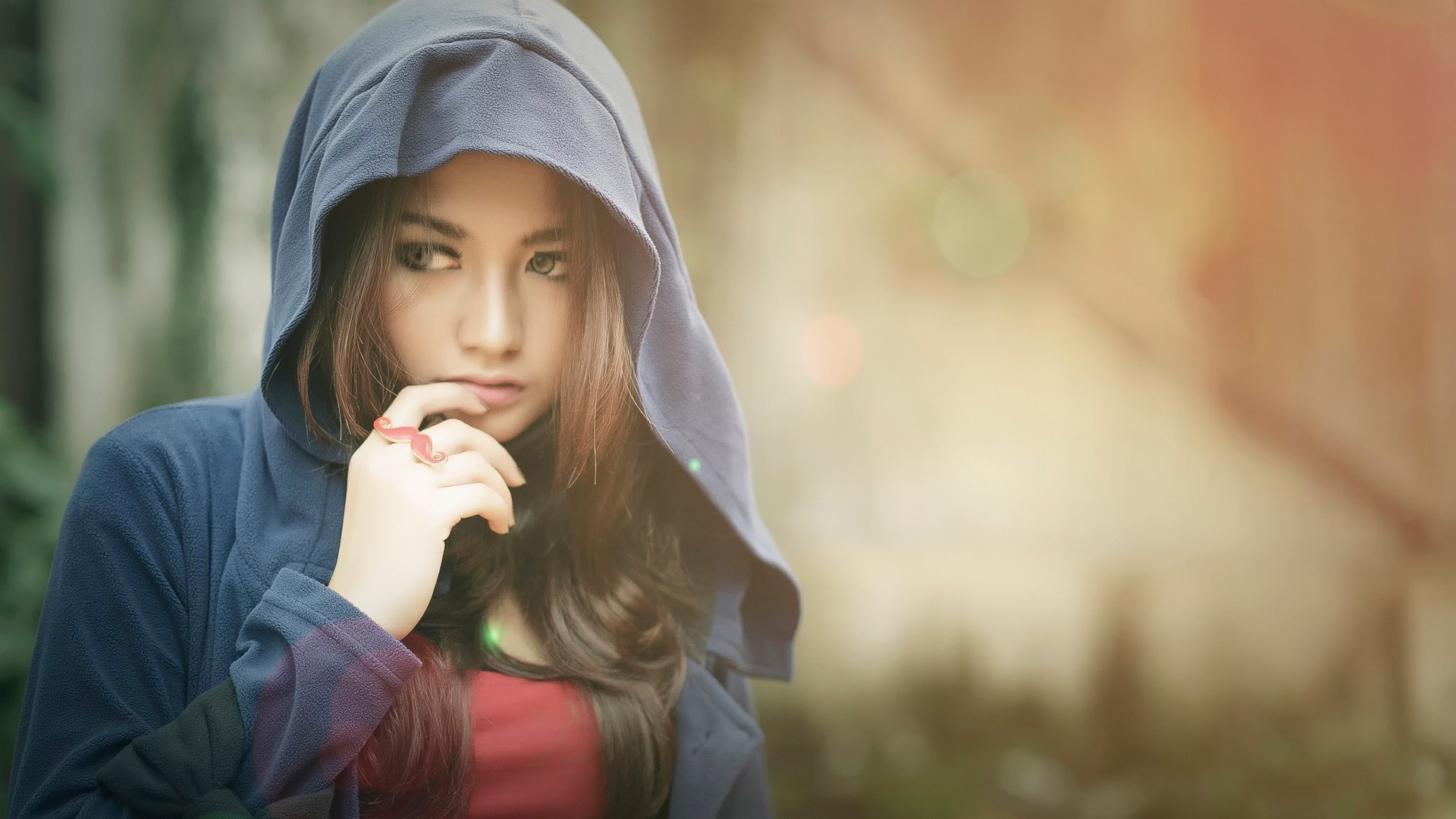 Woman wearing a blue hoodie with a red shirt HD Wallpaper