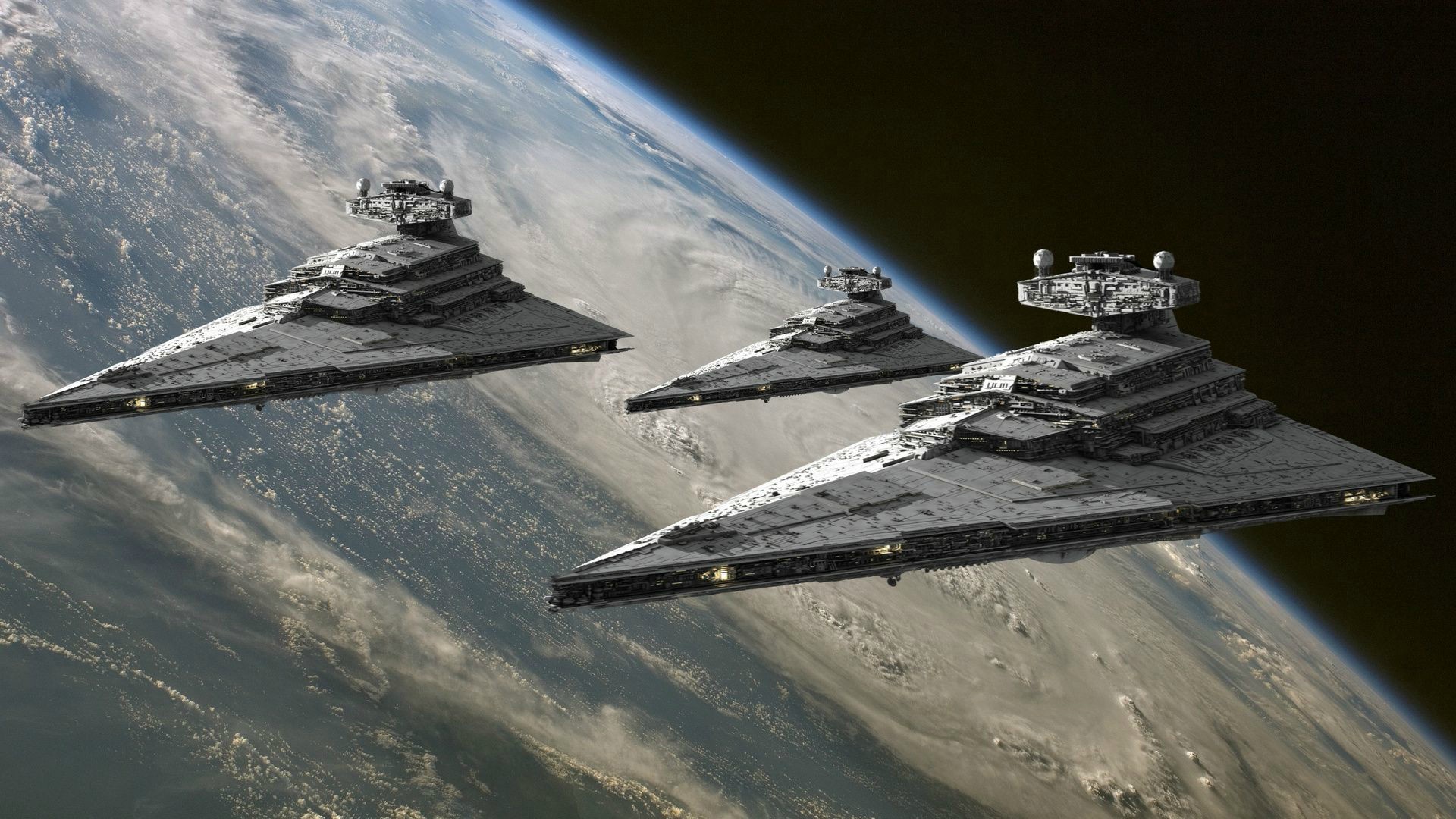 Star Wars Star Destroyers orbiting a planet HD Wallpaper