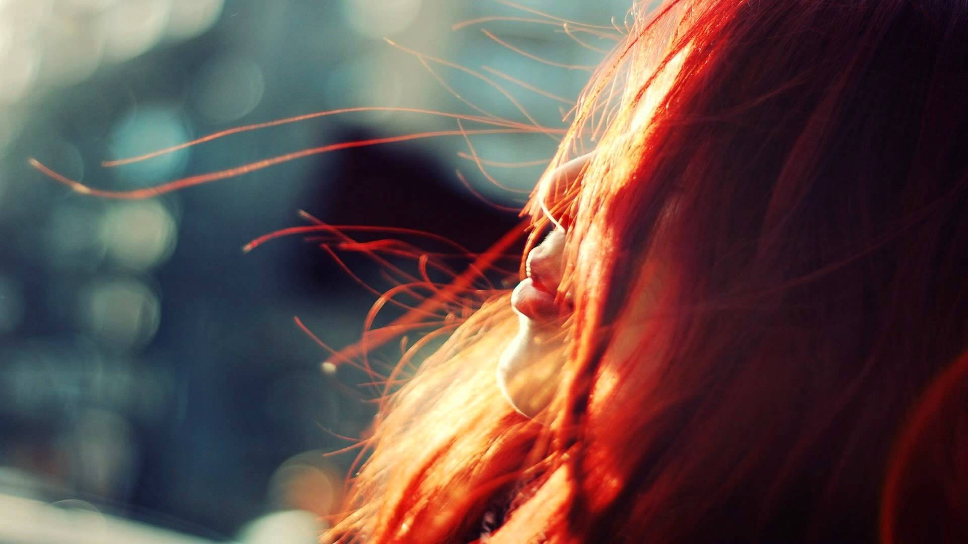 Redhead woman with hair blowing in the wind HD Wallpaper
