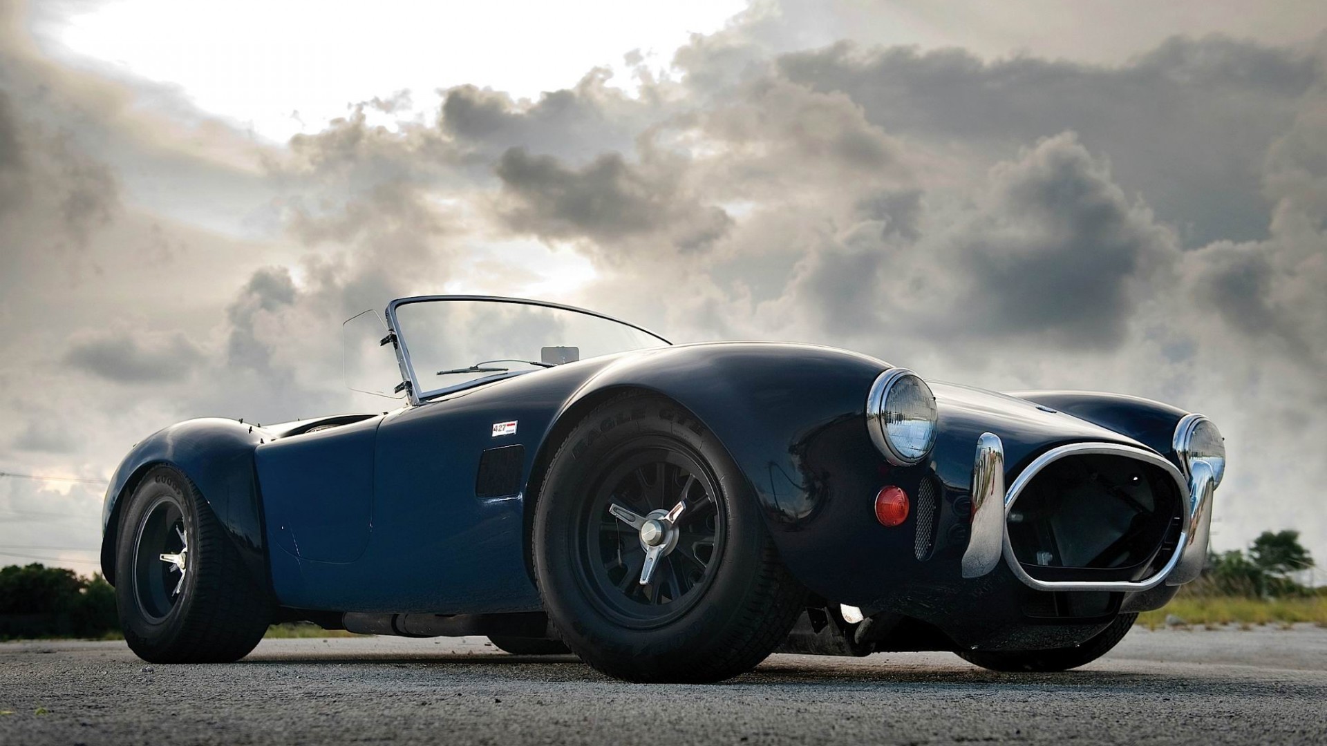 Blue Shelby Cobra car on a cloudy day HD Wallpaper
