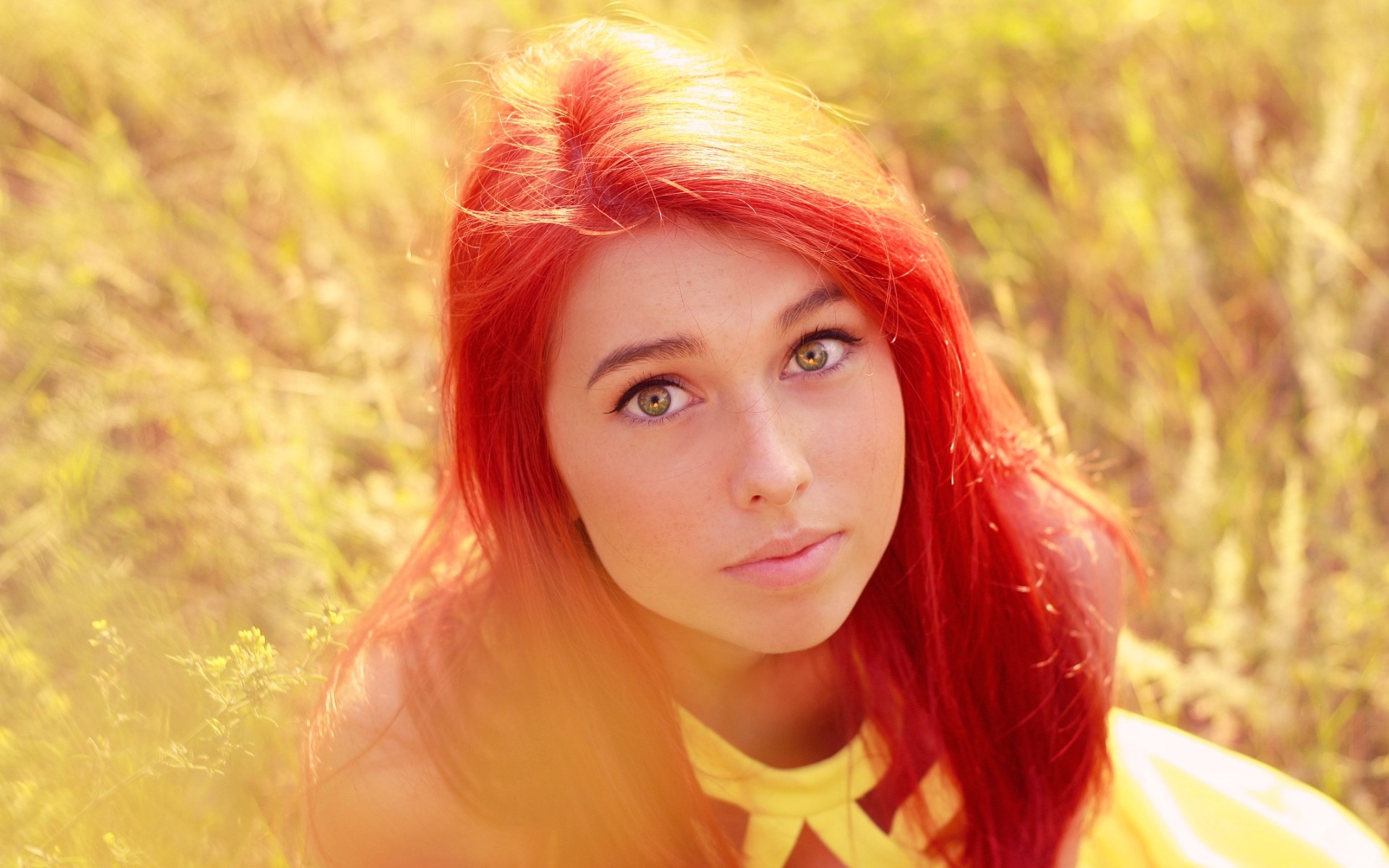 Young woman with dyed red hair in a field HD Wallpaper
