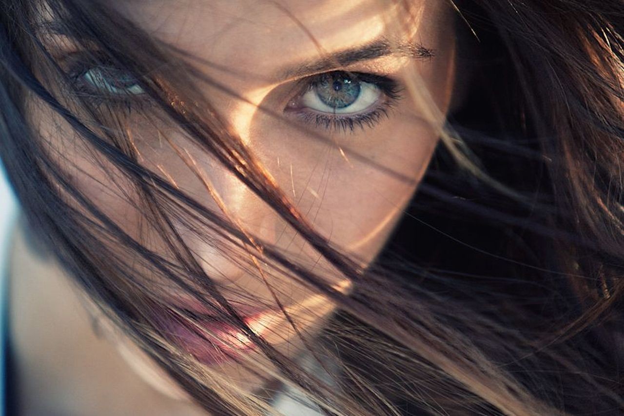 Woman with brown hair and blue eyes HD Wallpaper