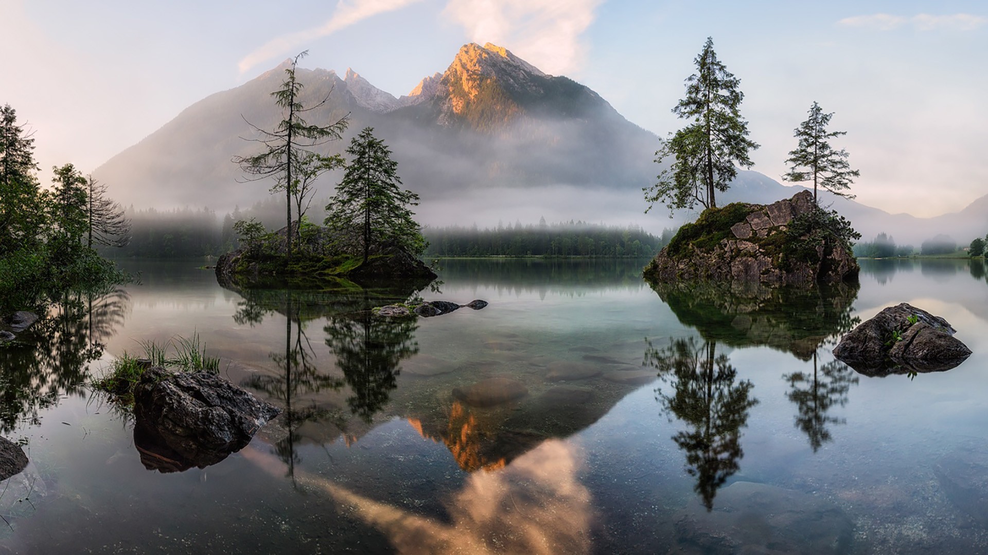 Lake and mountains with trees reflected in the water HD Wallpaper