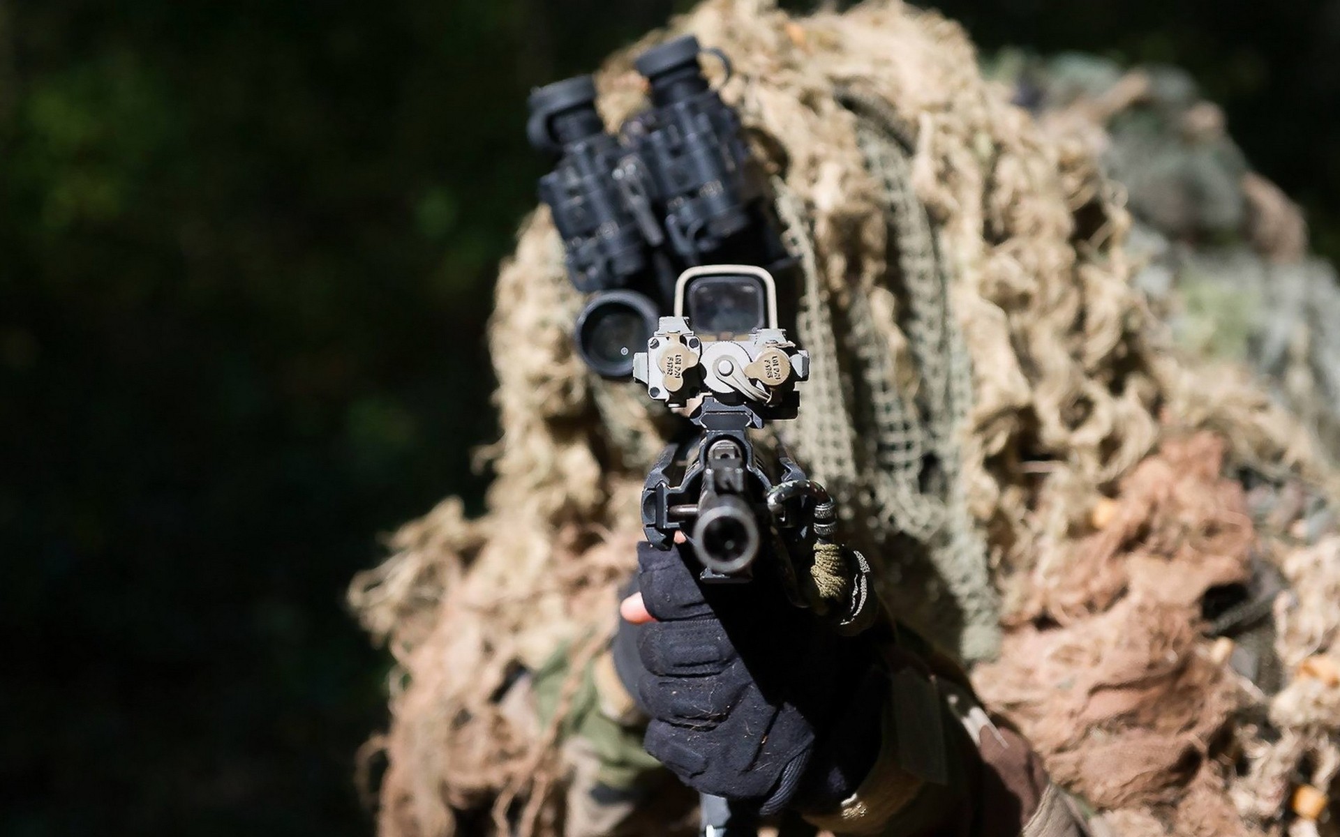 Sniper in camouflage aiming an AR-15 rifle HD Wallpaper
