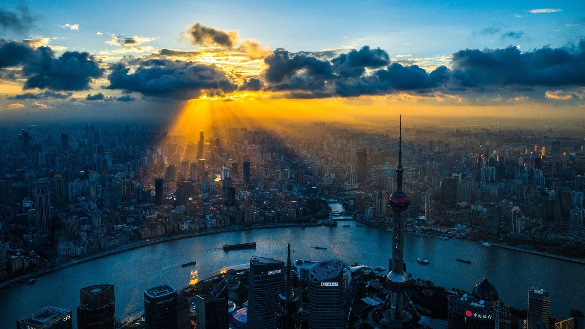 Shanghai skyline with sun rays over the city HD Wallpaper