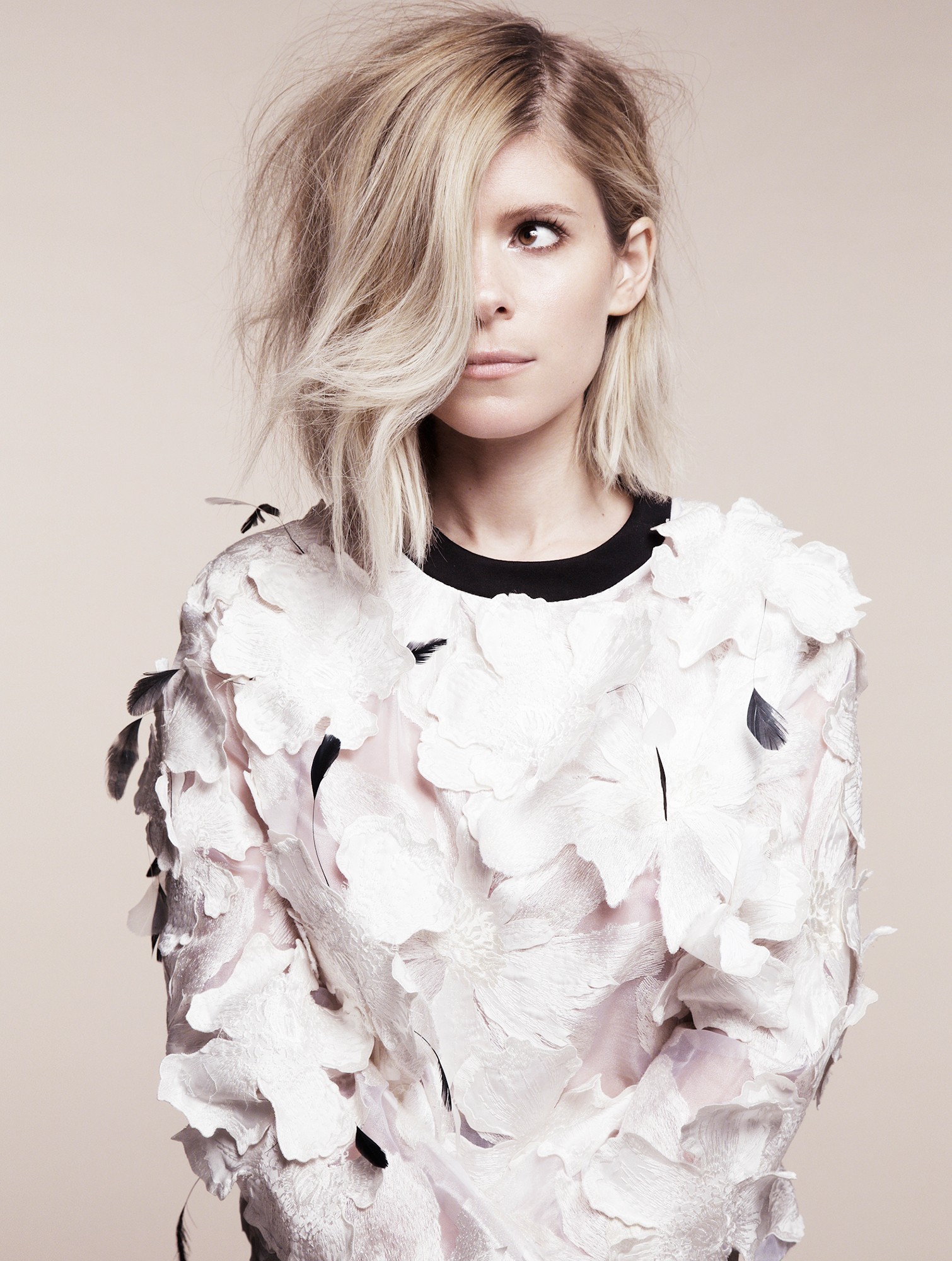 Kate Mara in a floral and feather top HD Wallpaper