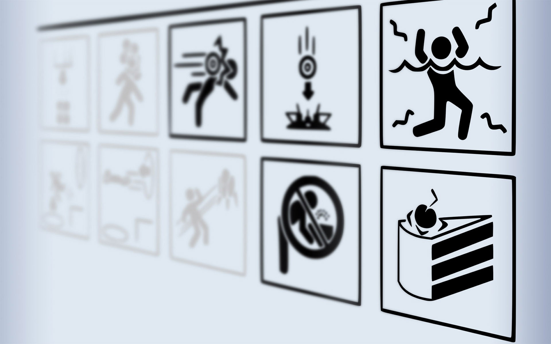 Portal game icons including cake and danger signs HD Wallpaper