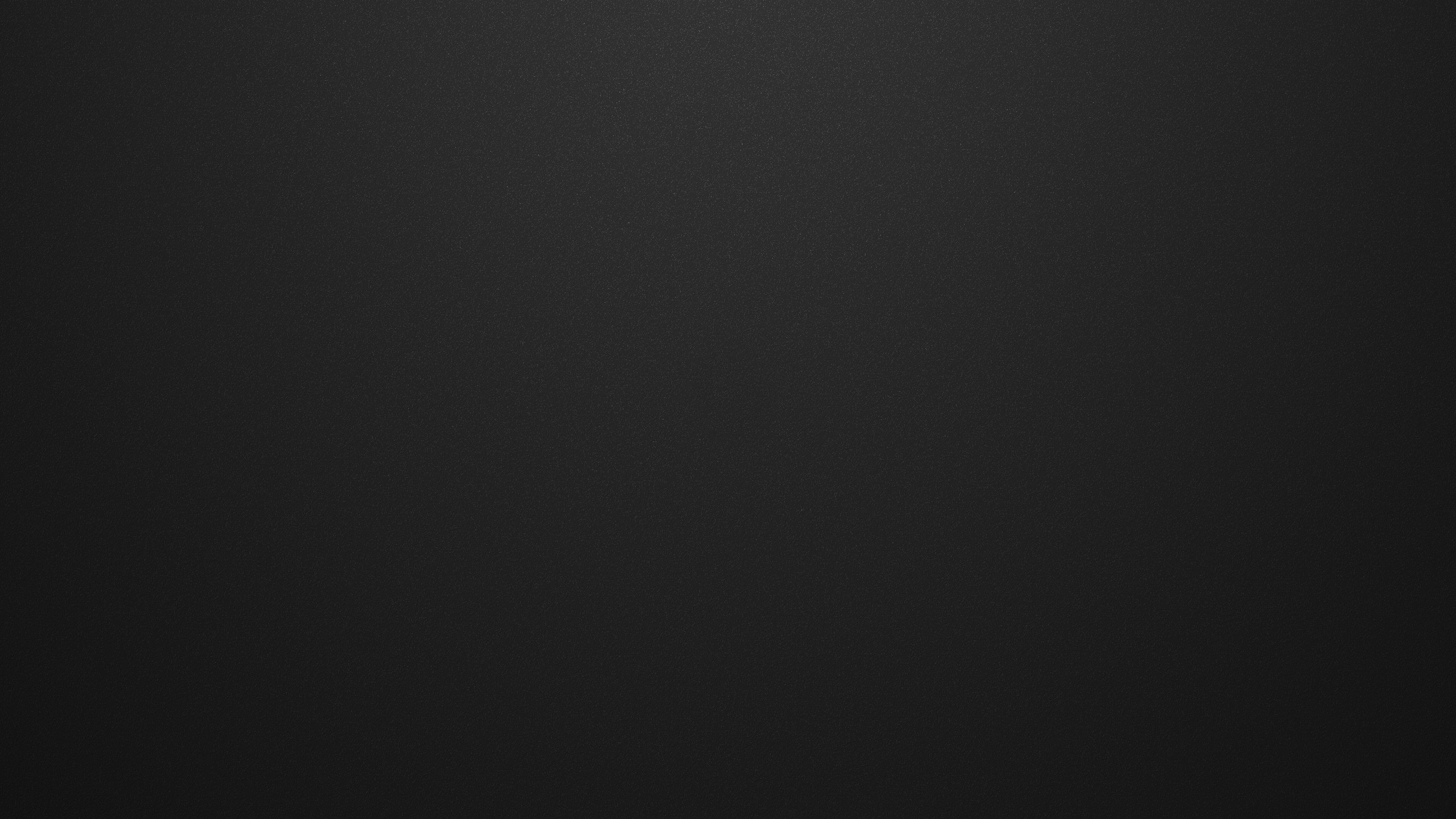 Dark textured surface with subtle lighting HD Wallpaper