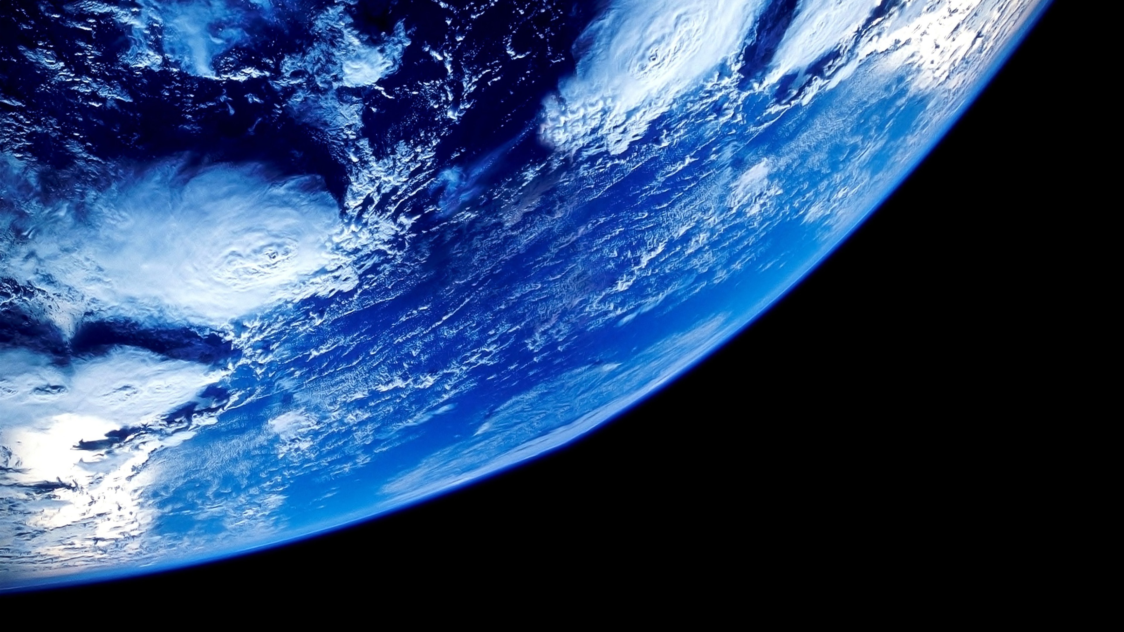The Earth from space with clouds HD Wallpaper
