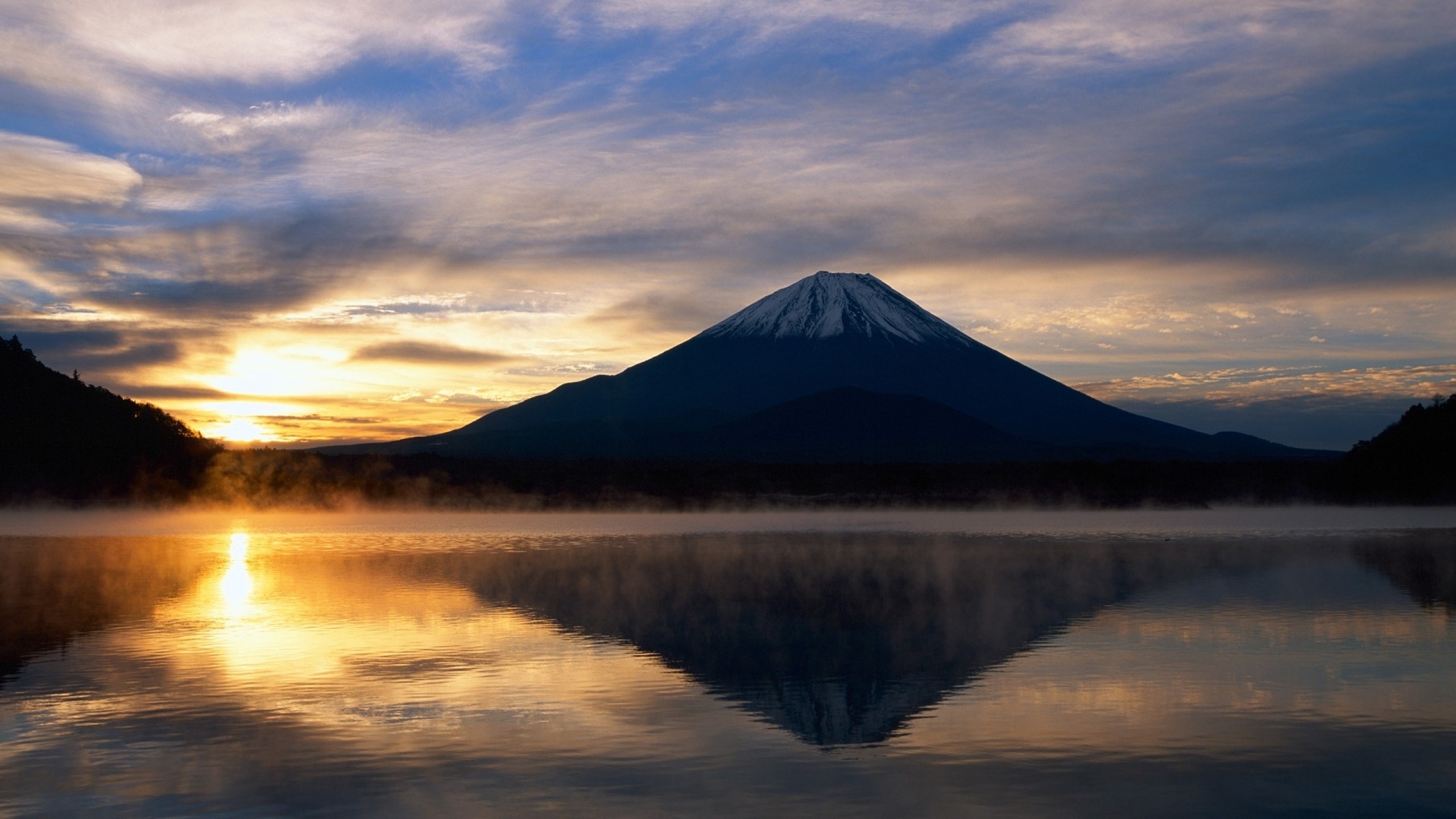 Mount Fuji reflected in a lake at sunrise HD Wallpaper