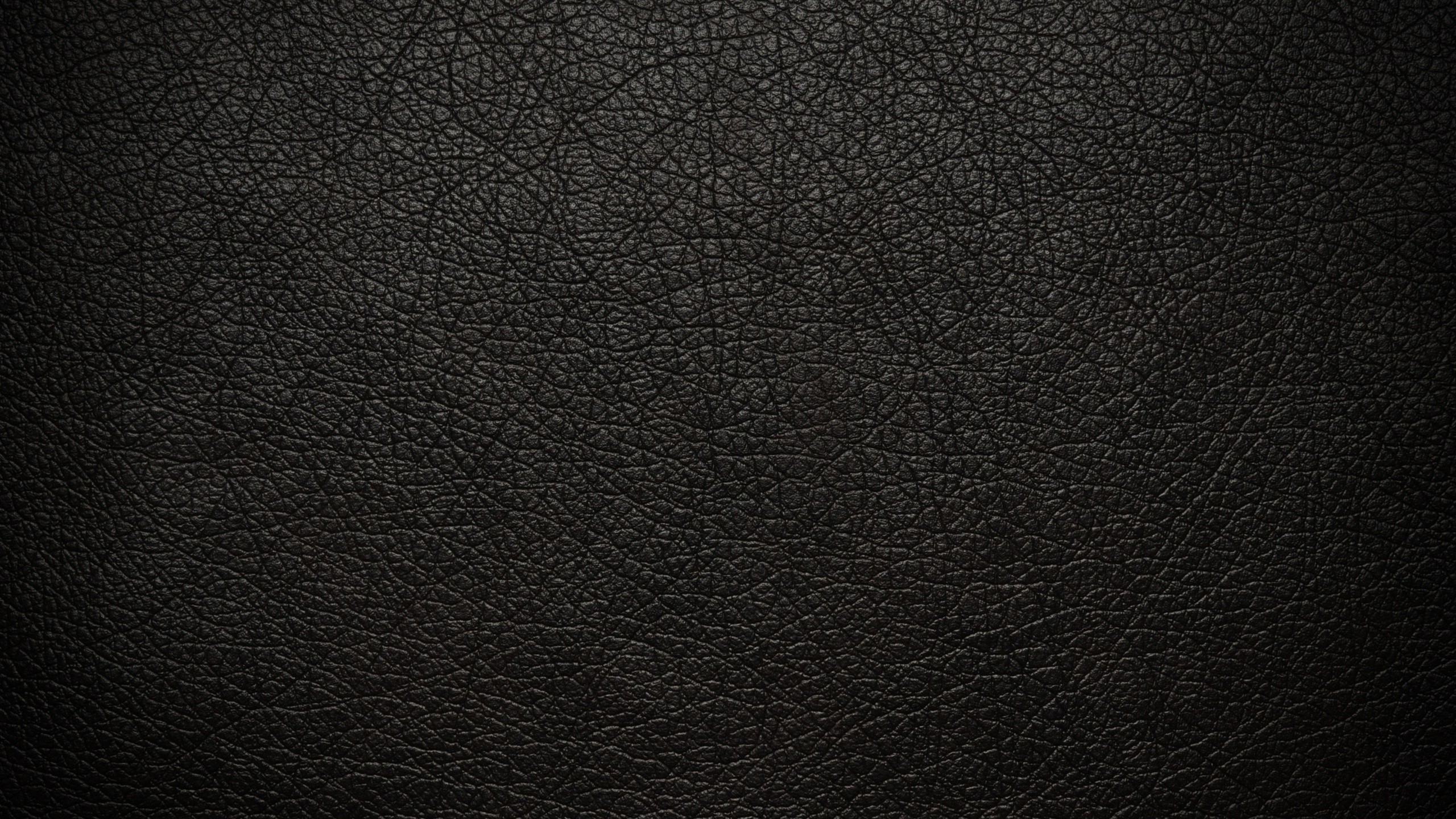 Black leather texture with a subtle gradient HD Wallpaper